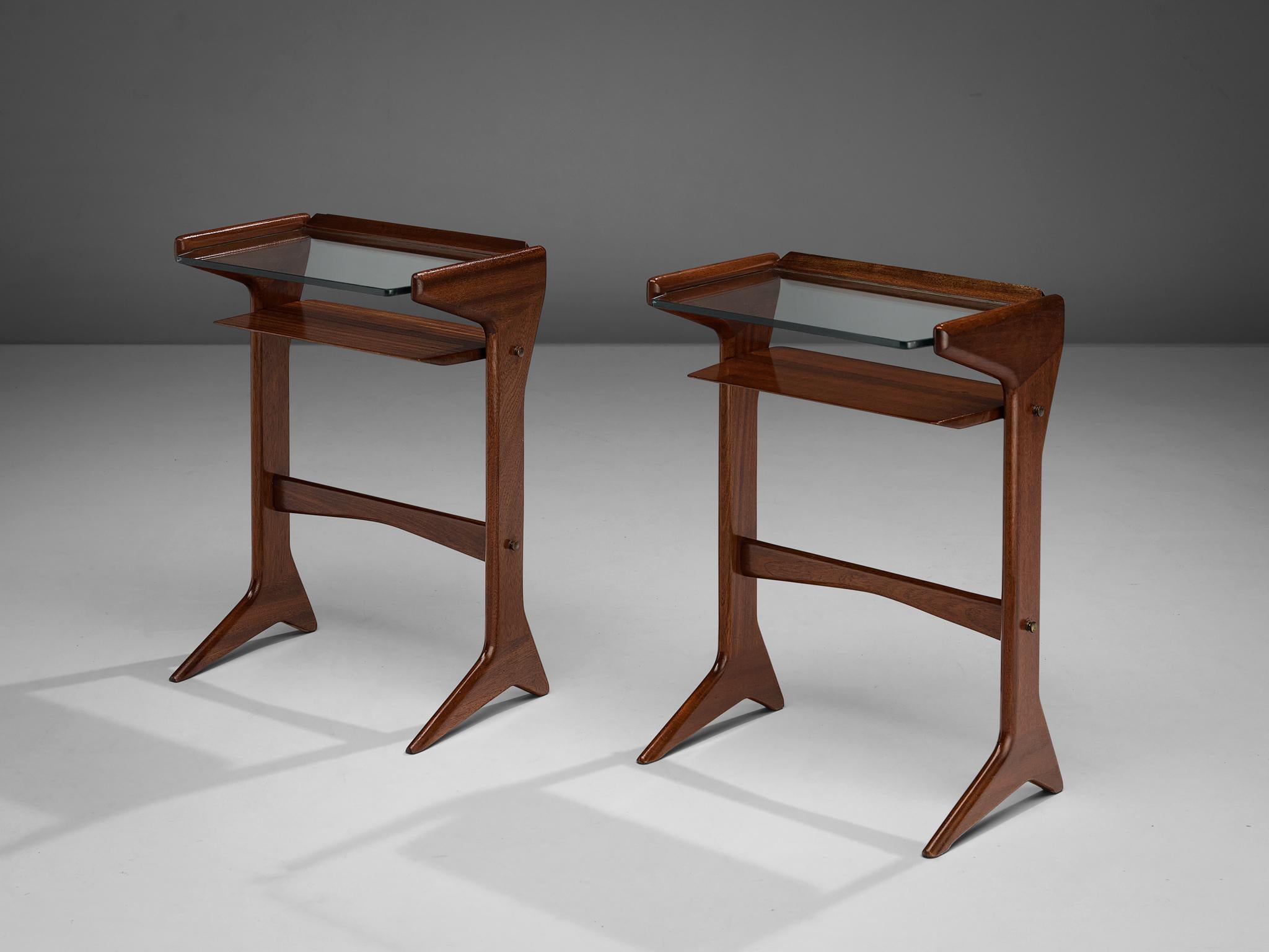 Ico Parisi for Angelo de Baggis, pair of side tables or night stands, model ‘360’, mahogany, glass, brass, Italy, designed in 1954

Ico Parisi designed the side tables model ‘360’ originally as telephone stands. He imagined the design to be