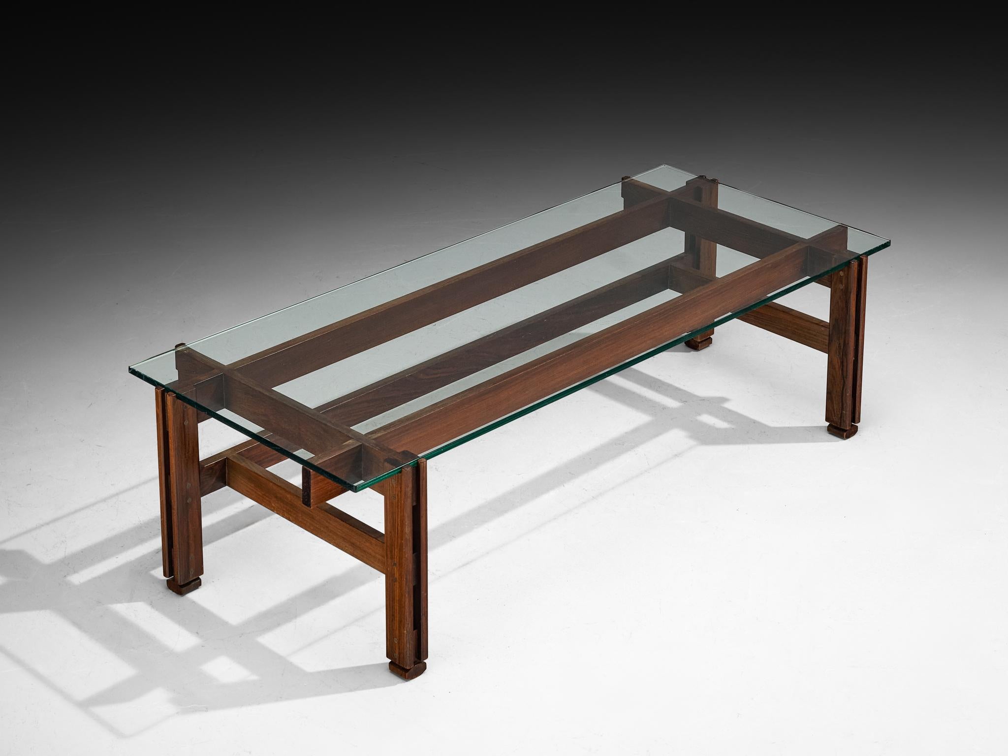 Ico Parisi for Figli di Amedeo Cassina, coffee table, model '751', stained wood, glass, Italy, 1962 

This coffee table, designed in 1962 by Ico Parisi for Figli di Amedeo Cassina (model 751), is built from a simple yet refined assembly of wooden