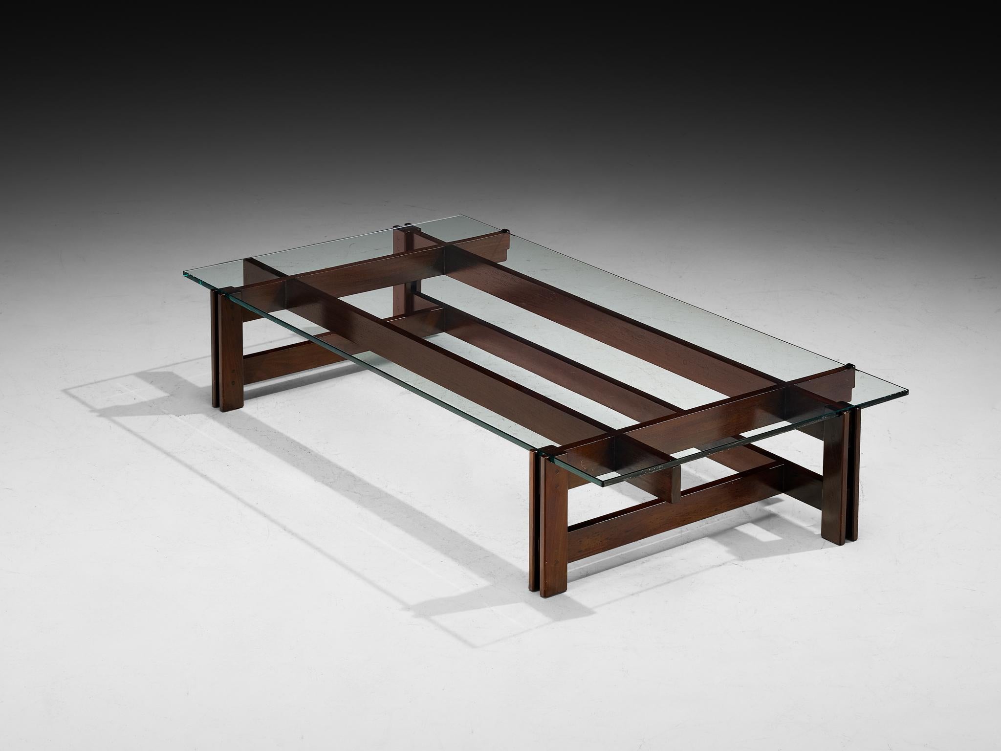 Ico Parisi for Figli di Amedeo Cassina, coffee table, model '751', stained wood, glass, Italy, 1962 

This coffee table, designed in 1962 by Ico Parisi for Figli di Amedeo Cassina (model 751), is built from a simple yet refined assembly of wooden