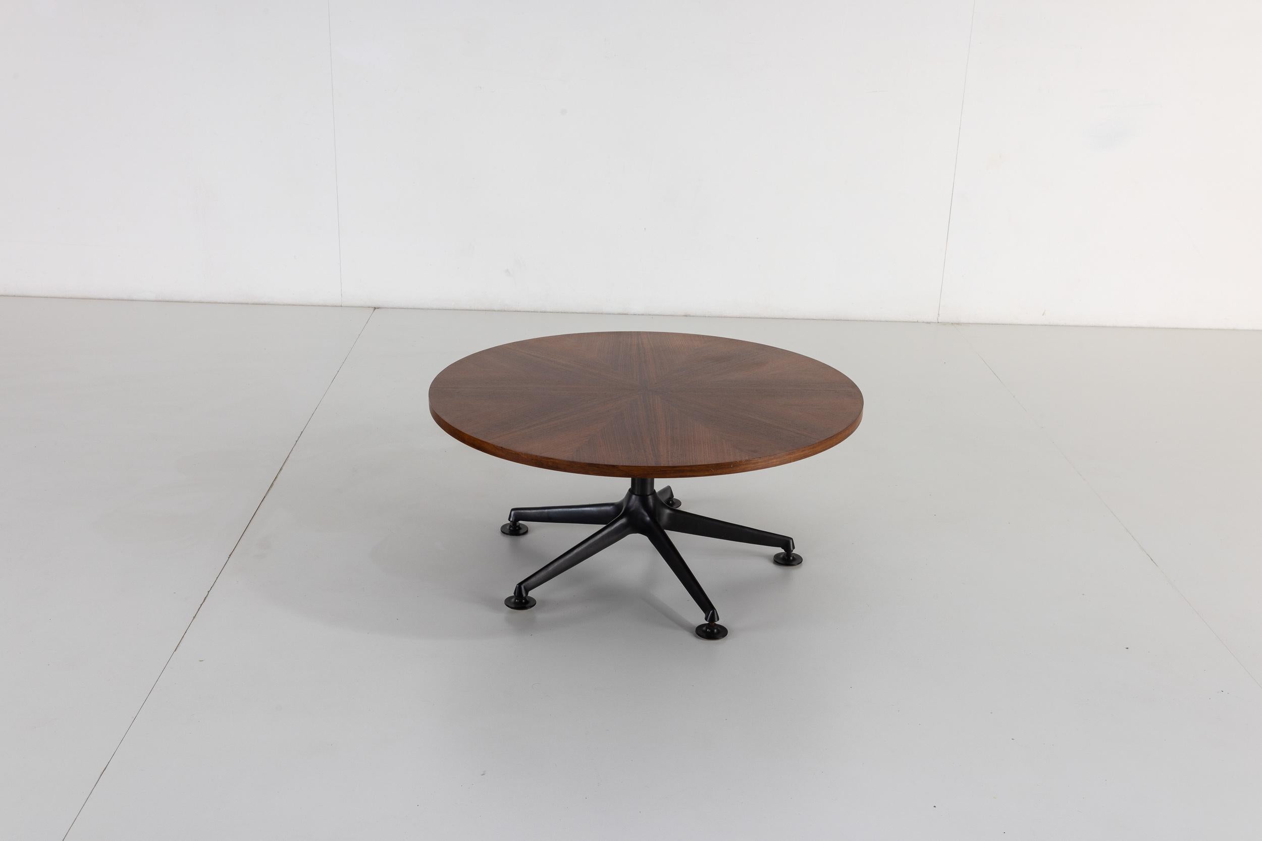 This exceptional low table made by Ico Parisi around 1960 represents a rich period of collaboration between the designer and the MIM (Mobili Italiani Moderni) which was established in Rome in 1957 as a company to design, build and sell