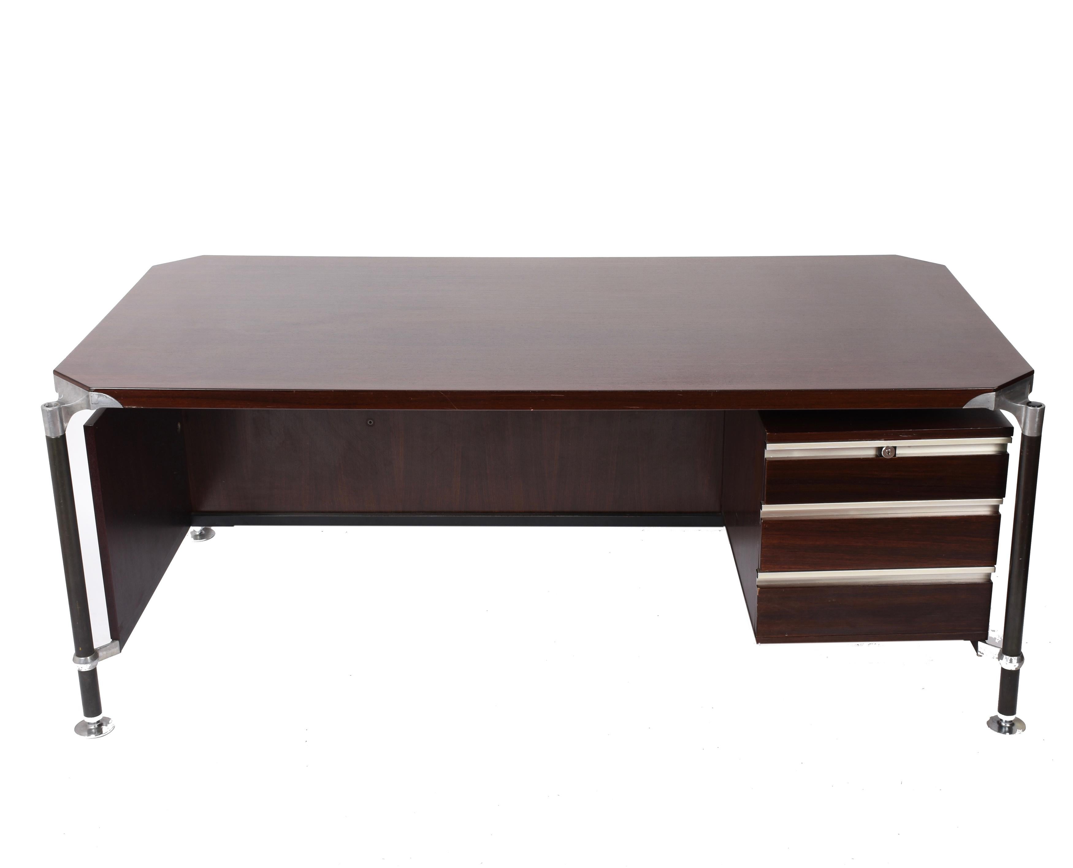 Desk designed by Luisa and Ico Parisi made in 1958 for MIM (Mobili Italiani Moderni) this desk combines excellent design with durable construction. A great example of Italian modernist design! Beautiful wood with three drawers on the left. Steel and