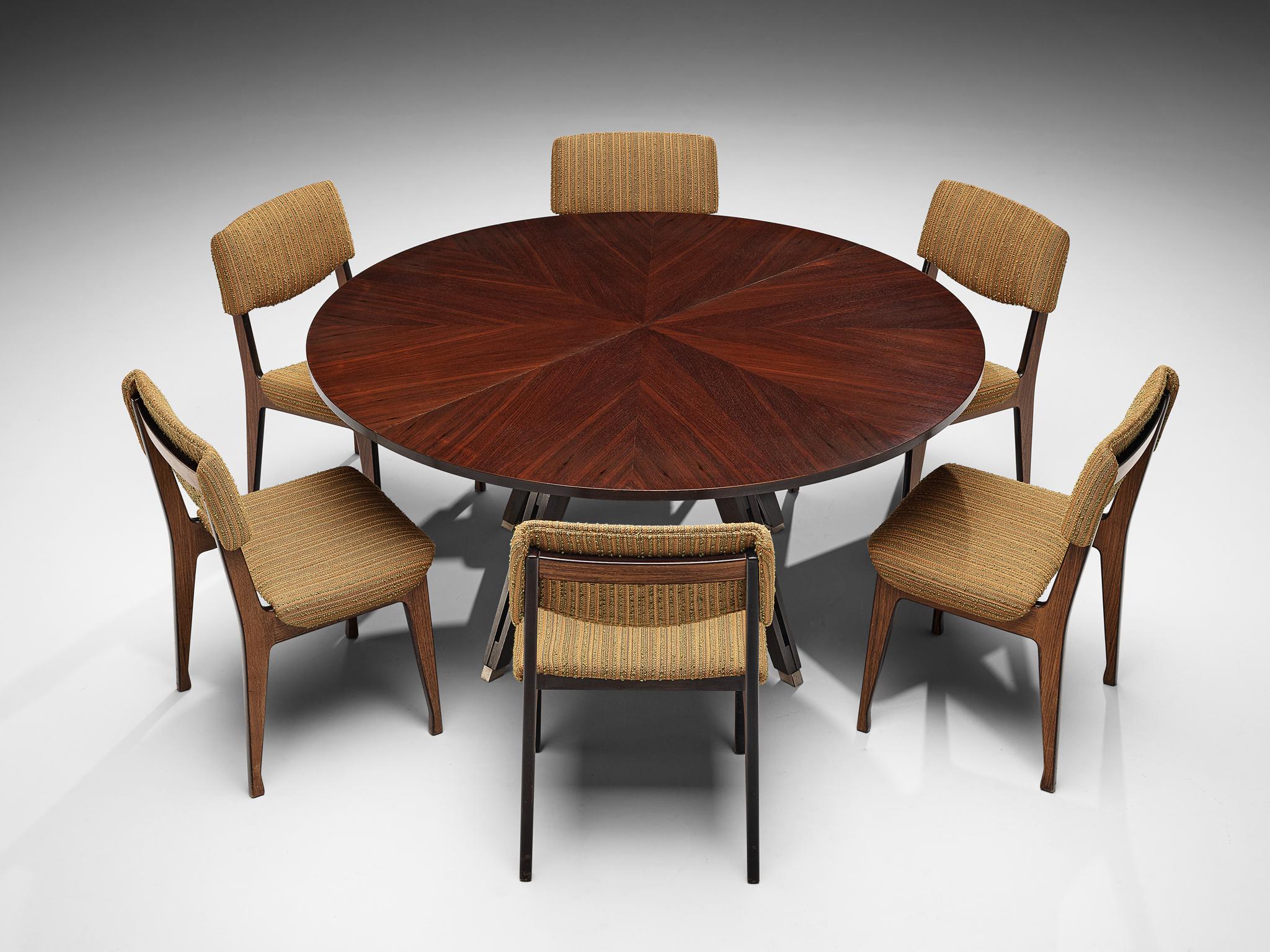 MIM Roma, set of six dining chairs, rosewood, fabric upholstery, Italy, 1960s
Ico Parisi for MIM Roma, dining table, rosewood and stainless steel, Italy, 1960s

This set of six dining chairs for MIM Roma shows a well balanced design. With its