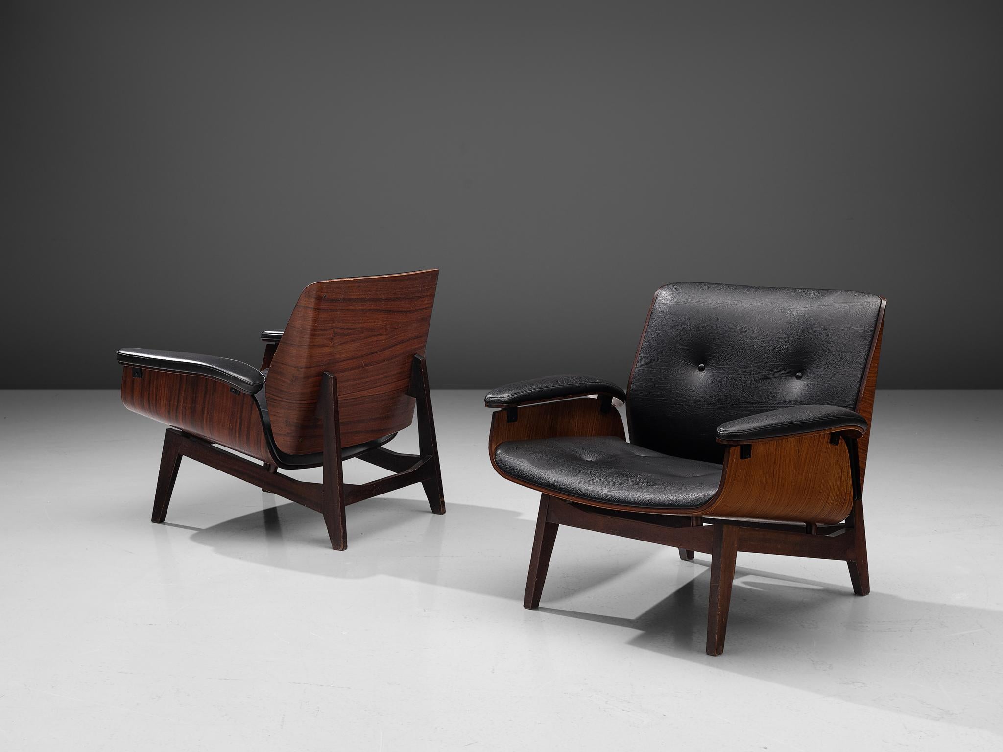 Ico Parisi MIM Roma, pair of lounge chairs, rosewood, black faux leather, Italy, 1960s.

Pair of armchair with rosewood frame and orange fabric upholstery. Signature chair by MIM Roma. The seating and back are nicely curved and mirrored to each