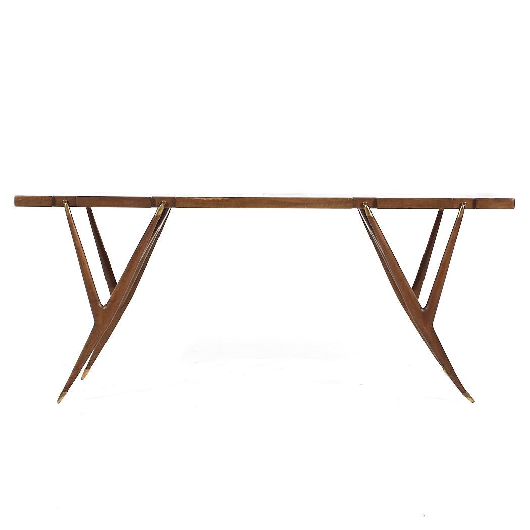 Ico Parisi for Singer and Sons Mid Century Walnut and Brass Console Table

This console table measures: 71 wide x 19.75 deep x 29.25 inches high

All pieces of furniture can be had in what we call restored vintage condition. That means the piece is