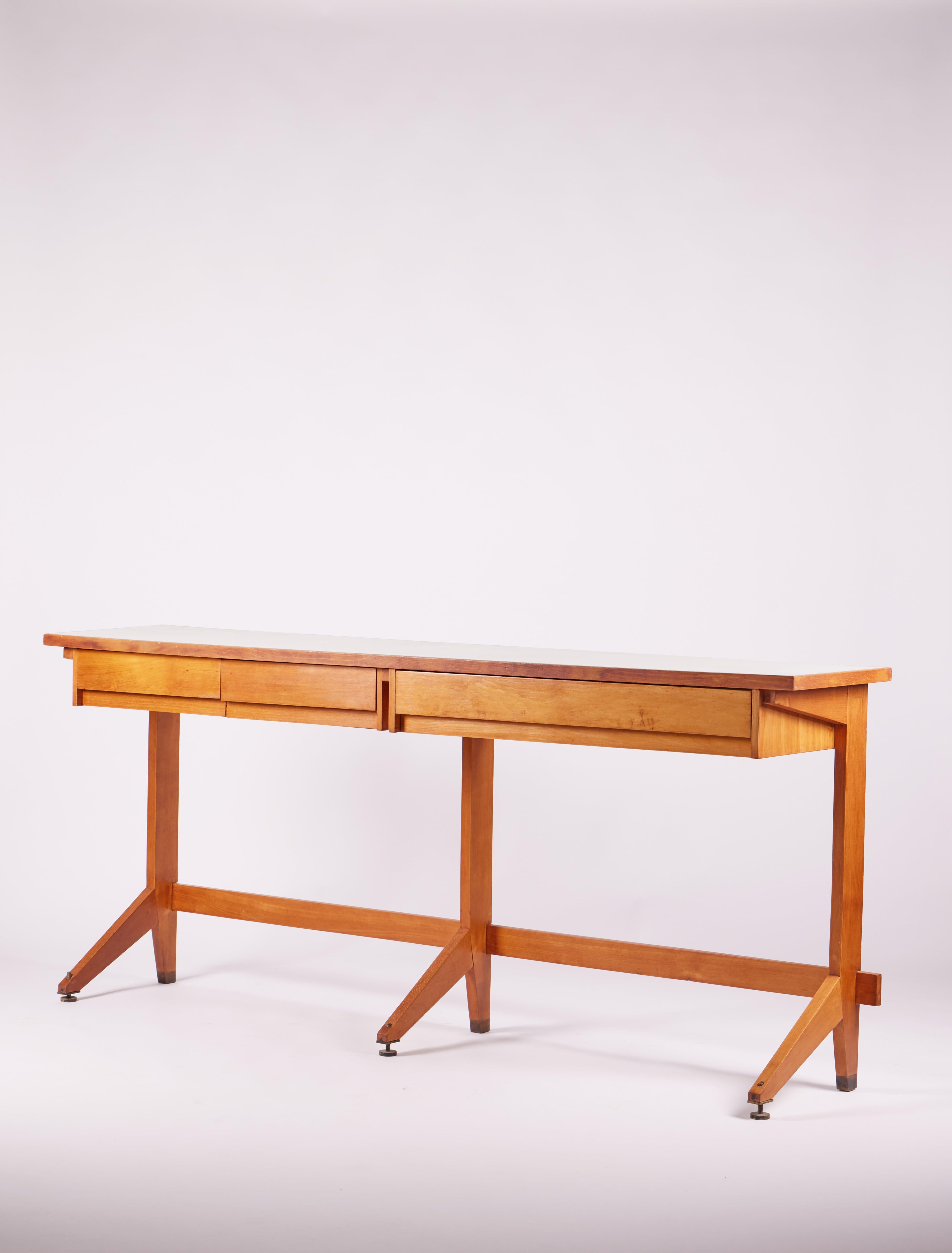 Ico Parisi, Italian midcentury long sideboard in walnut with white top, circa 1950

Ico Parisi played a significant role in the mid-20th-century design scene. He had a diverse career that spanned architecture, interior design, and furniture design.
