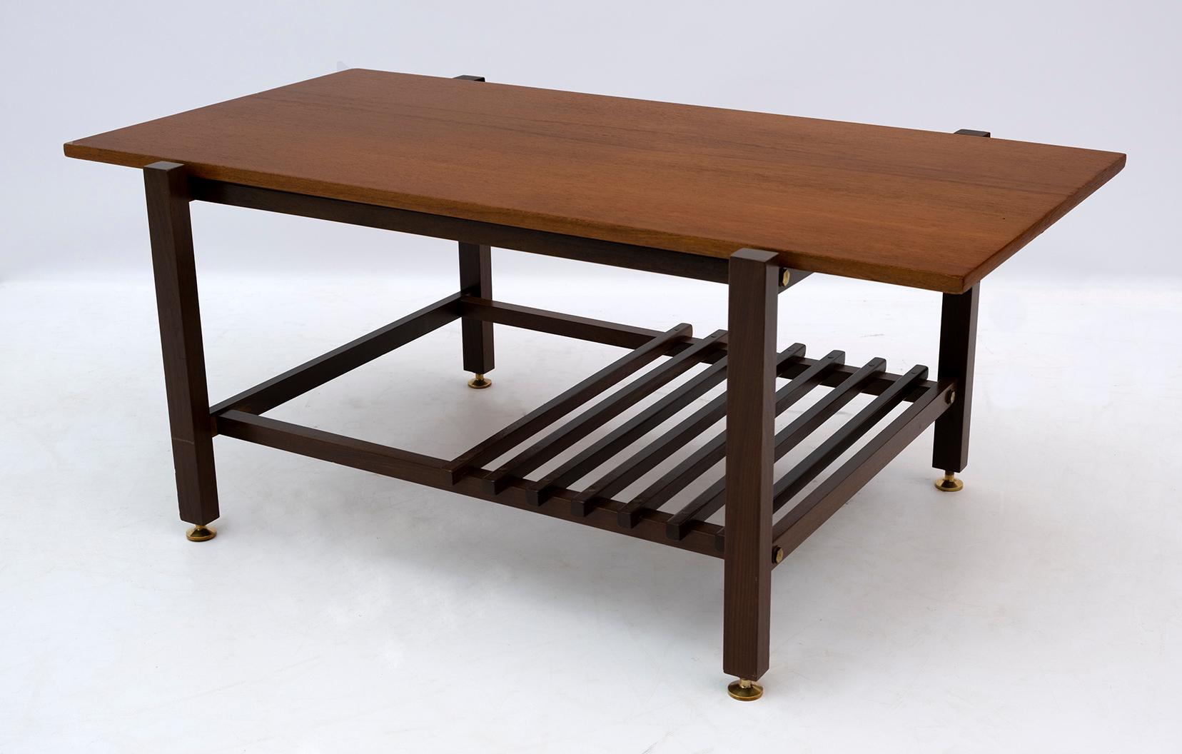 This coffee table was designed by Ico Parisi and produced in the 1950s, the table has been restored and polished with shellac, the feet are in brass.