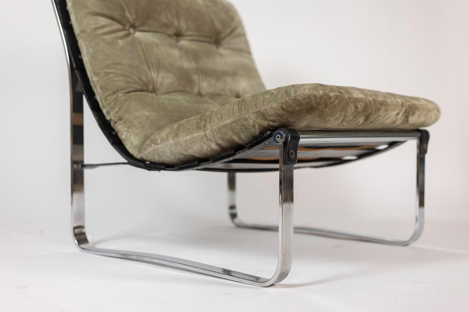 Ico Parisi, by.

Pair of armchairs. Chromed metal base. Light green suede cushion, padded. Black leather straps.

Italian work realized in the 1970s.

Reference: LS57121089D