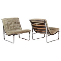 Retro Ico Parisi. Pair of armchairs in chrome metal and suede. 1970s.