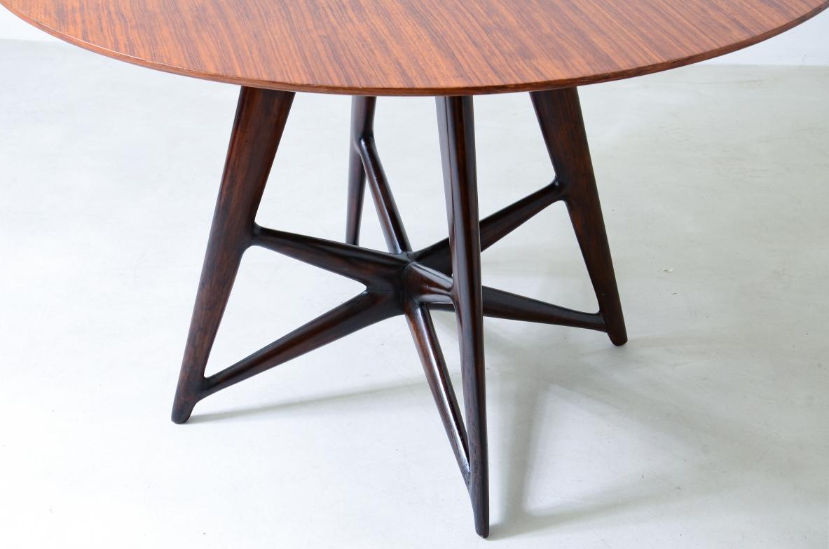 Italian Ico Parisi, rare walnut table with a sculptural sunburst base For Sale