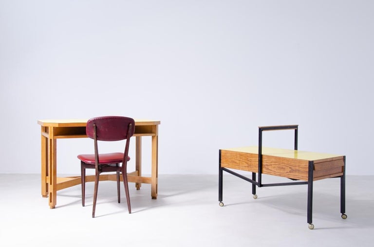 Ico Parisi, set consisting of a small desk with chair and coffee table on wheels with two drawers. The desk and coffee table have their original top in laminate preserved in perfect condition.
These furnishings were custom made for a bedroom in a