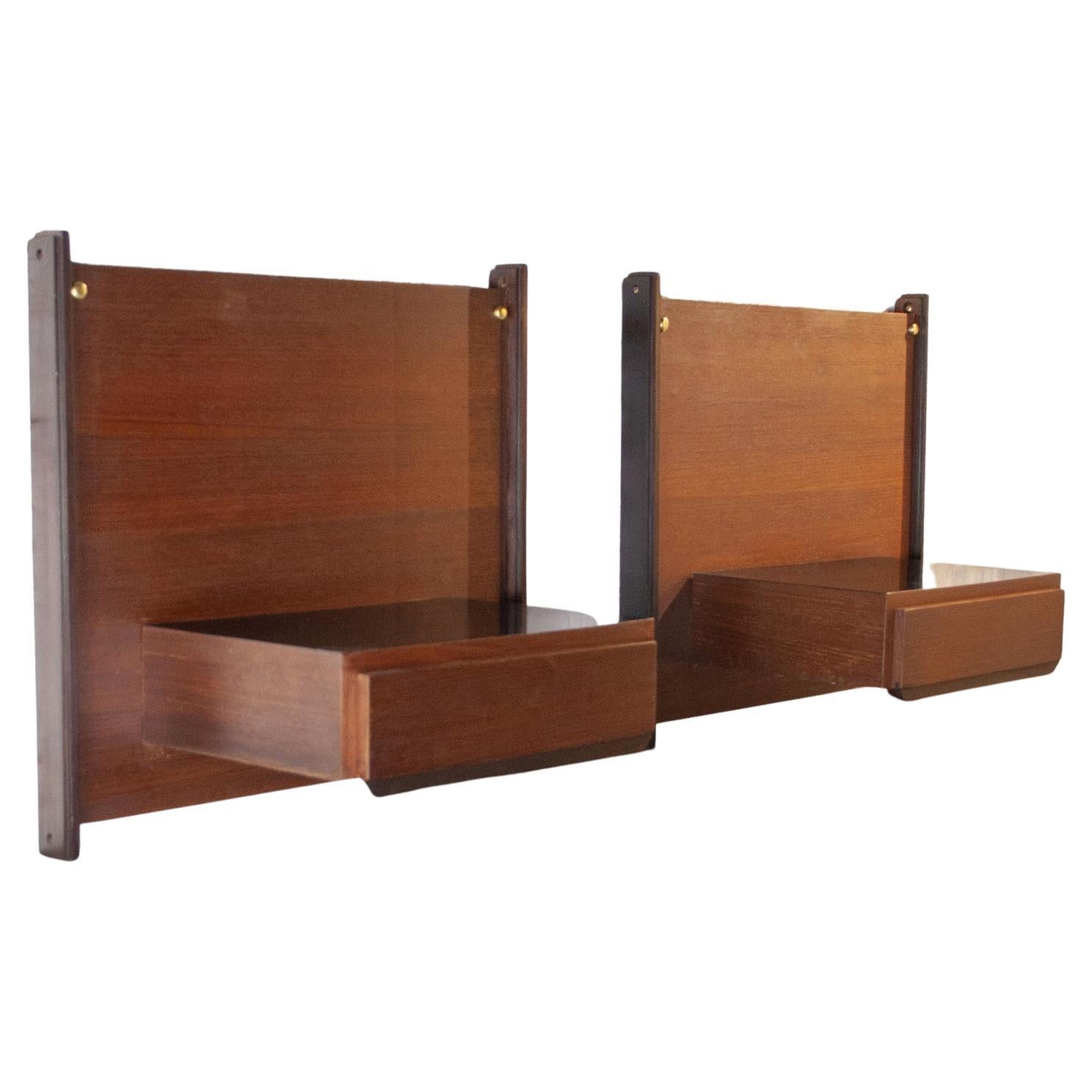 Pair of wall-mounted night stands with one drawer. Italian production late 1960s in the style of Ico Parisi.

Ico Parisi was born in Palermo in 1916. He gained a diploma in construction and served his apprenticeship in Giuseppe Terragni's studio.
