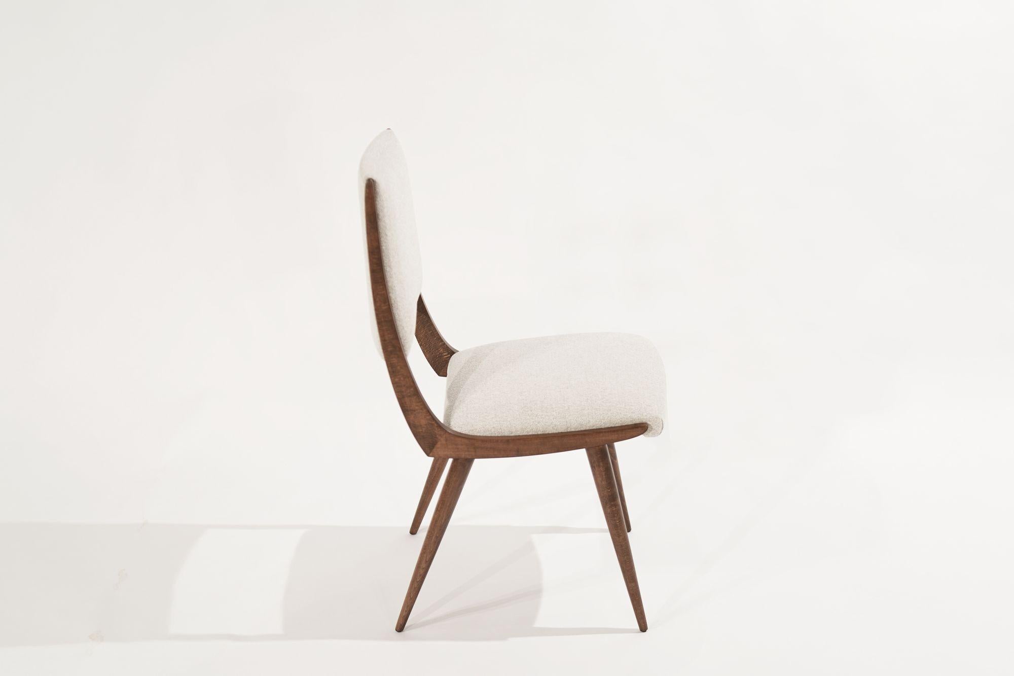 Introducing our Exquisite Parisiano Chair, inspired by the iconic designs of Ico Parisi. Crafted with meticulous attention to detail, this chair combines timeless elegance with modern functionality. Made from premium walnut, it exudes a warm and