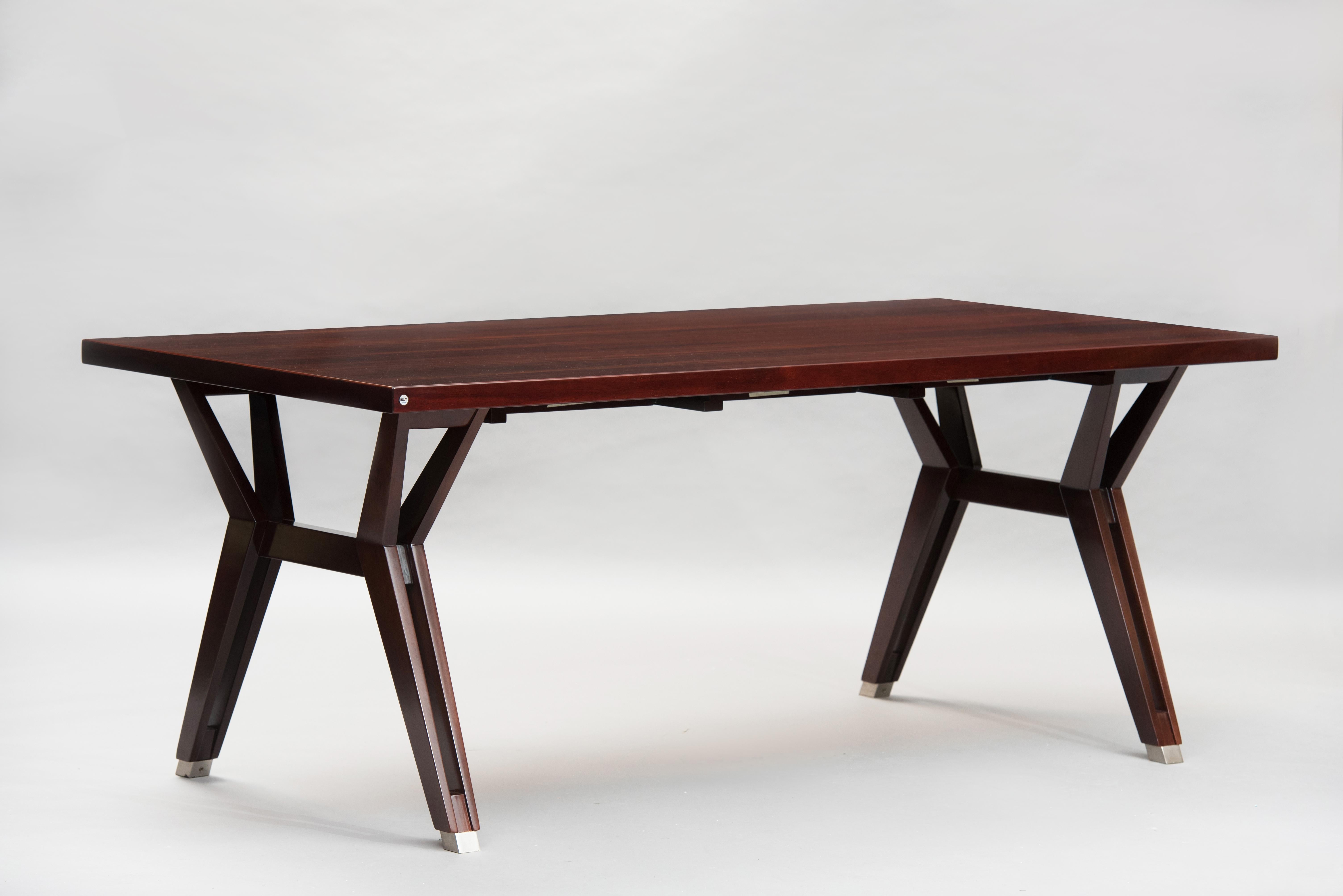 Ico Parisi rosewood and aluminium tips writing table with three small drawers manufactured by MIM in 1950s.