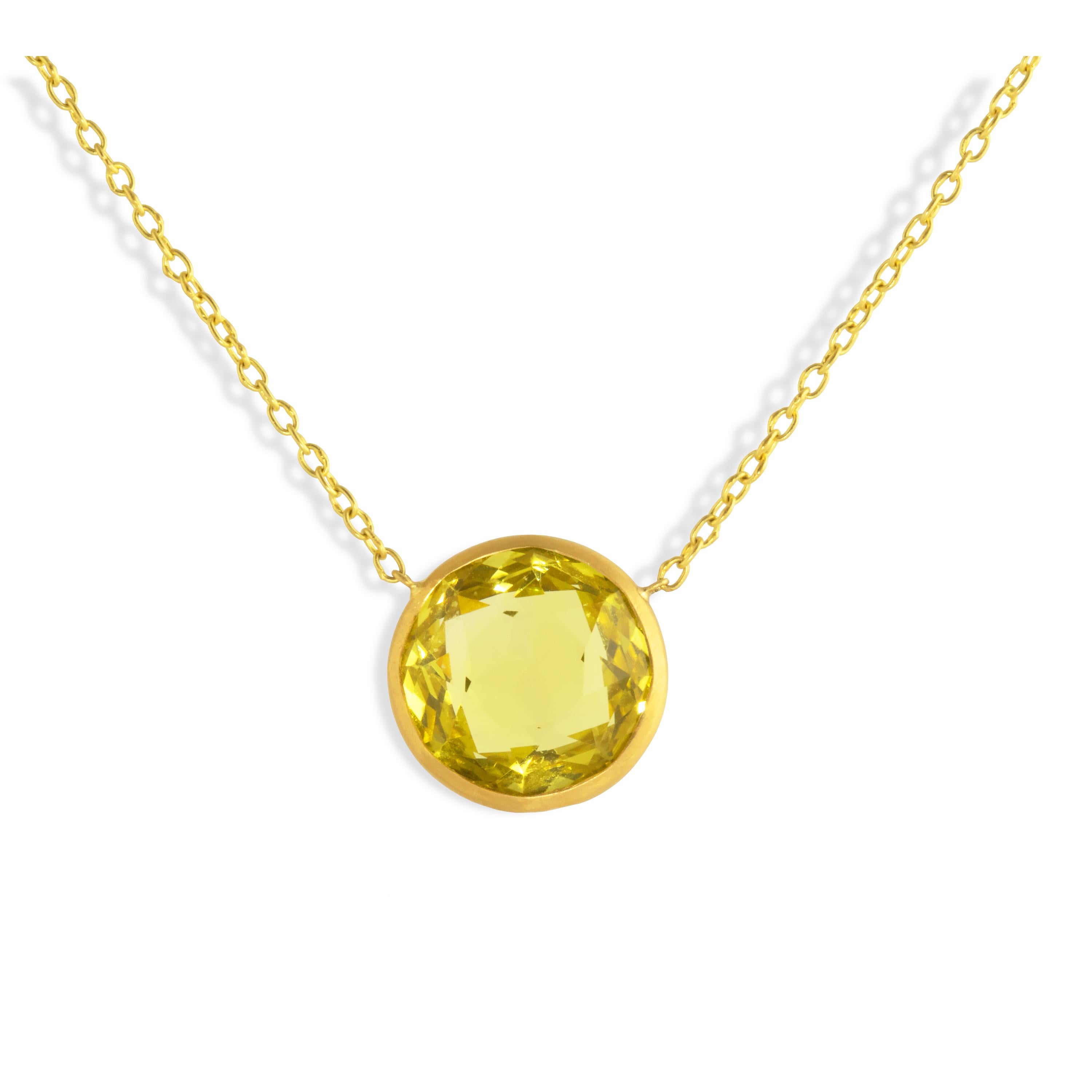 Featuring a 10 carat Lemon Quartz double sided faceted Necklace set in 22k gold and featured on a 22k gold chain.  Hook closure.  Perfect alone or layered with other necklaces.

The bright yellow color of Lemon Quartz is considered a symbol of