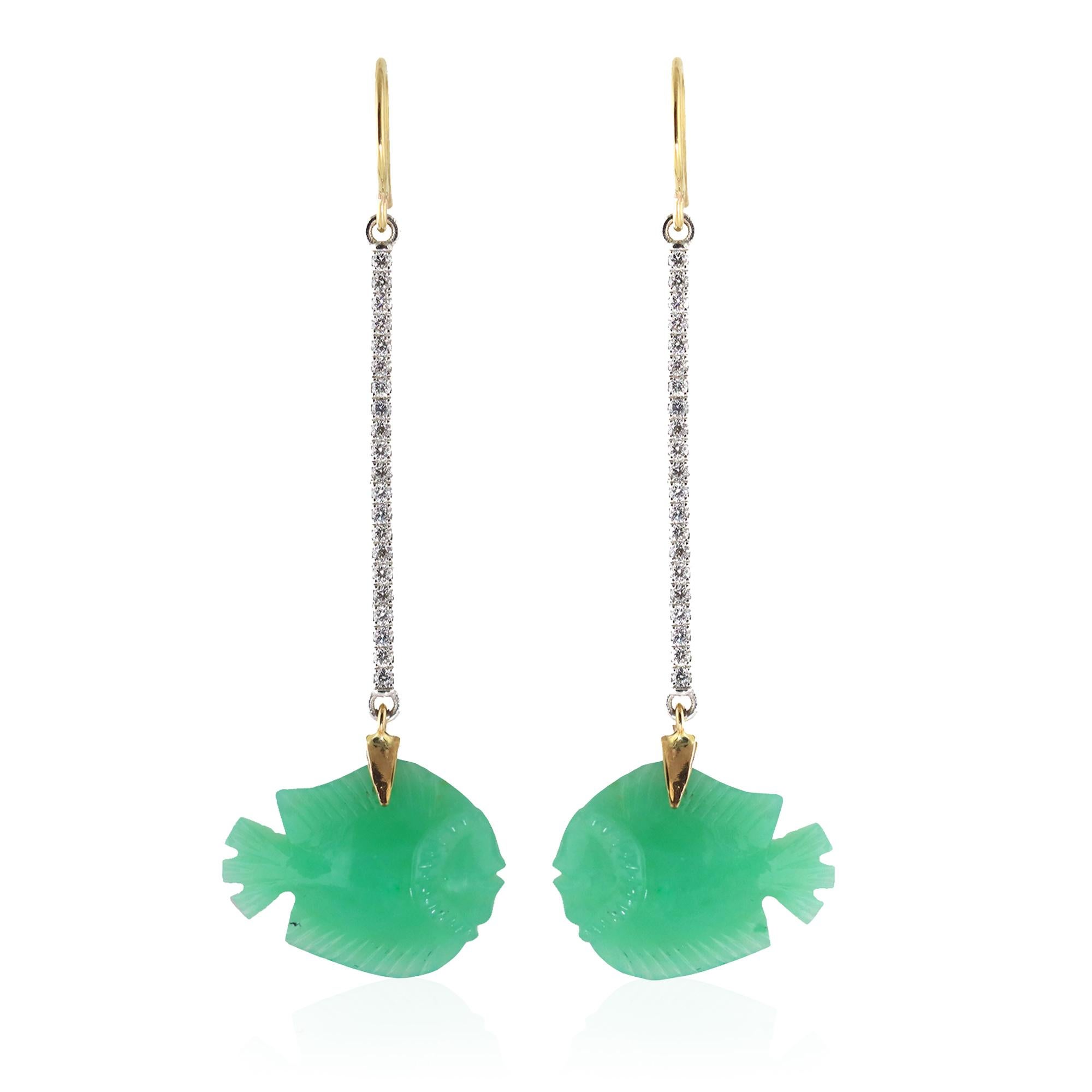 Bright Green Australian Chrysoprase Fish decorate diamond stick earrings.   Forty-two brilliant cut diamonds (.38 cts) decorate the sticks which end with two hand carved fish.
A glamorous and whimsical piece of jewelry.  Earrings are set with in 22k