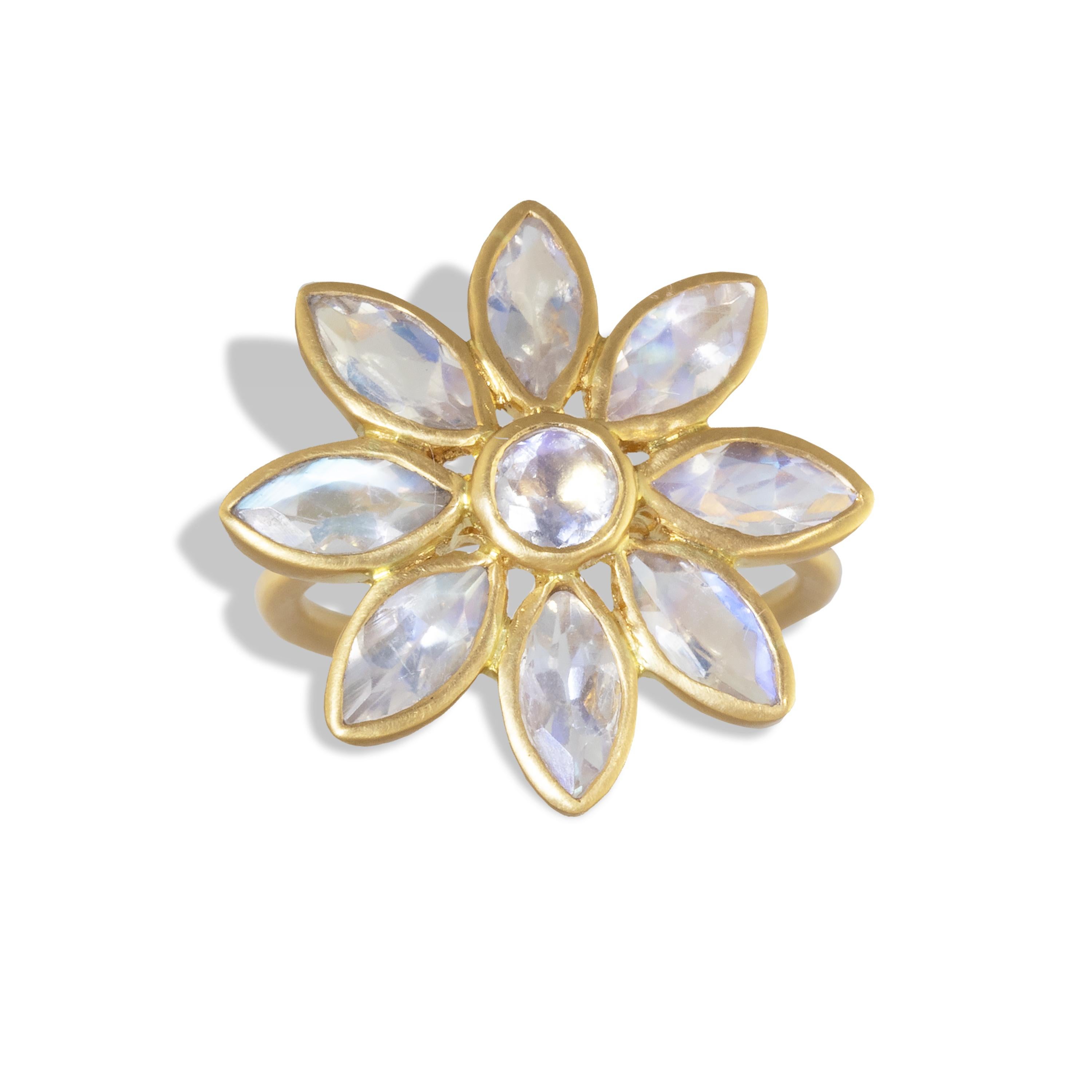 This dreamy flower ring featuring 4.75 carats of faceted marquise cut Rainbow Moonstone set in 20k matte yellow gold.  Simple and dramatic and set in 22k matte yellow gold. 
This ring is one of a kind. It was made by hand in our workshop in Jaipur,
