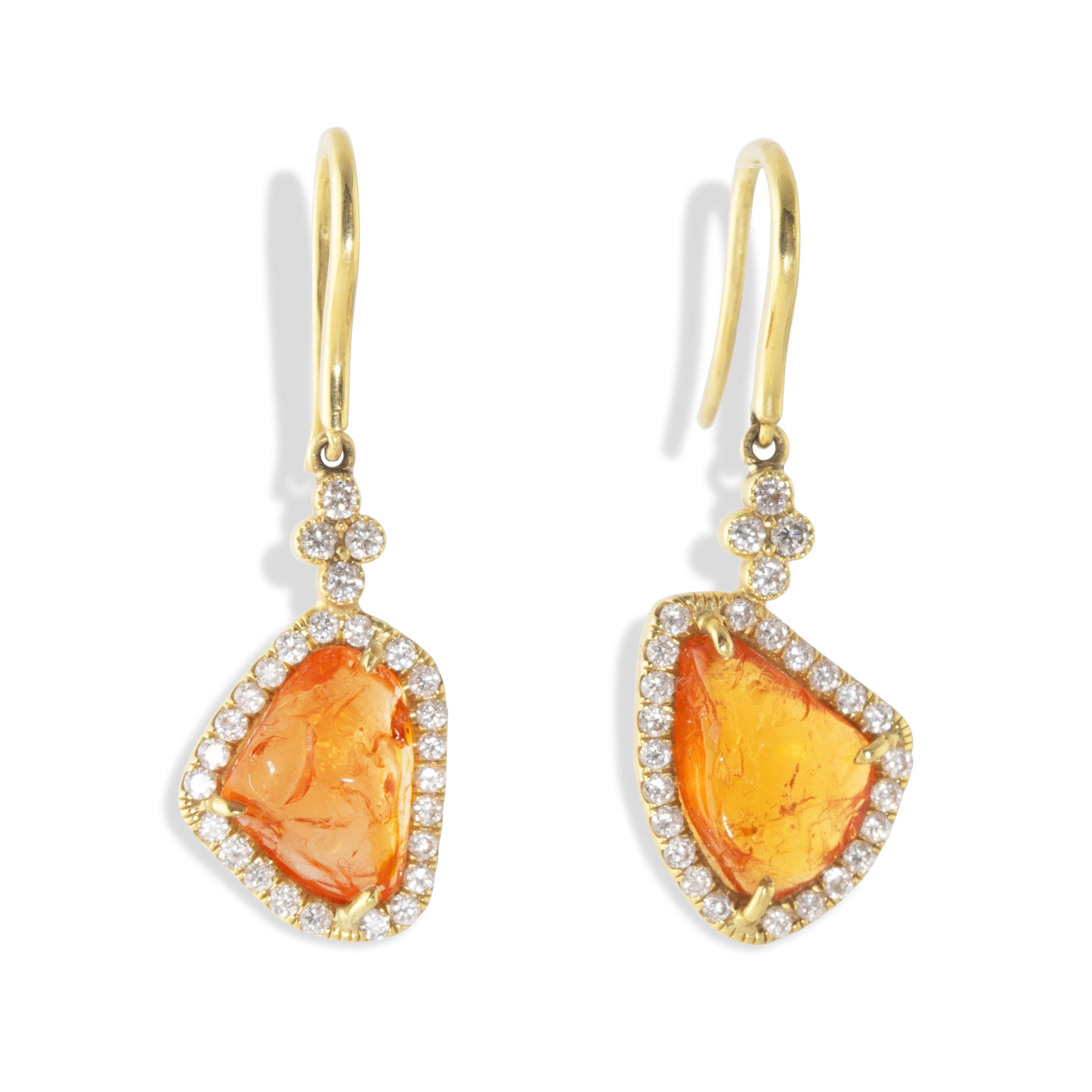 Raw Spessartite Orange Garnet gemstone diamond earrings.  Designed as part of the Wave Collection, the bright orange centers are framed in diamonds with a diamond clover at the top. Featuring 5 carats of raw Orange garnet, surrounded with diamonds