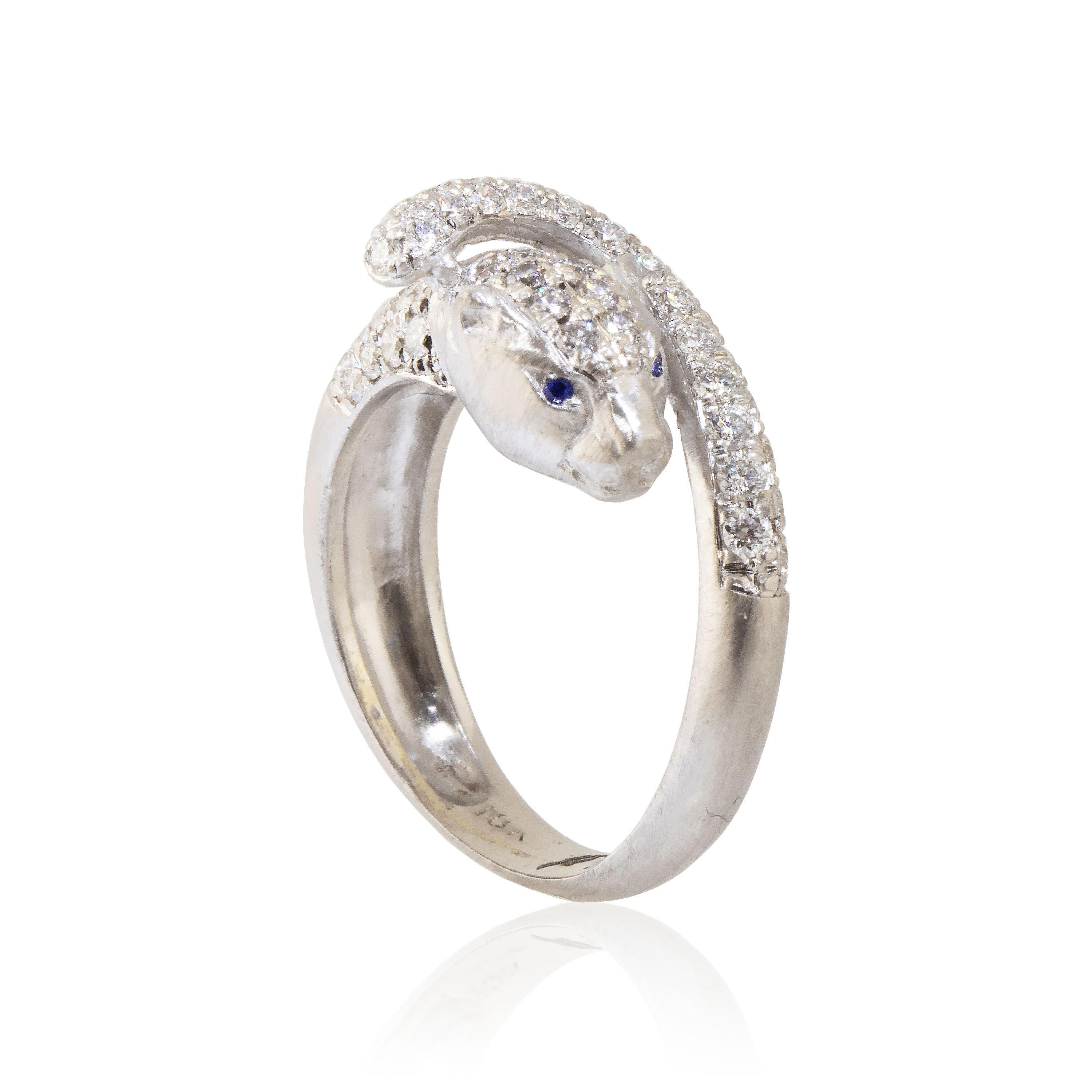 This amazing White Panther ring features Sapphire (.02cts) eyes with .43 carats of white VVS diamonds and Matt finished in 18k white gold.

The panther symbolizes courage, valor and power. The panther symbolizes the mother, the dark moon and the