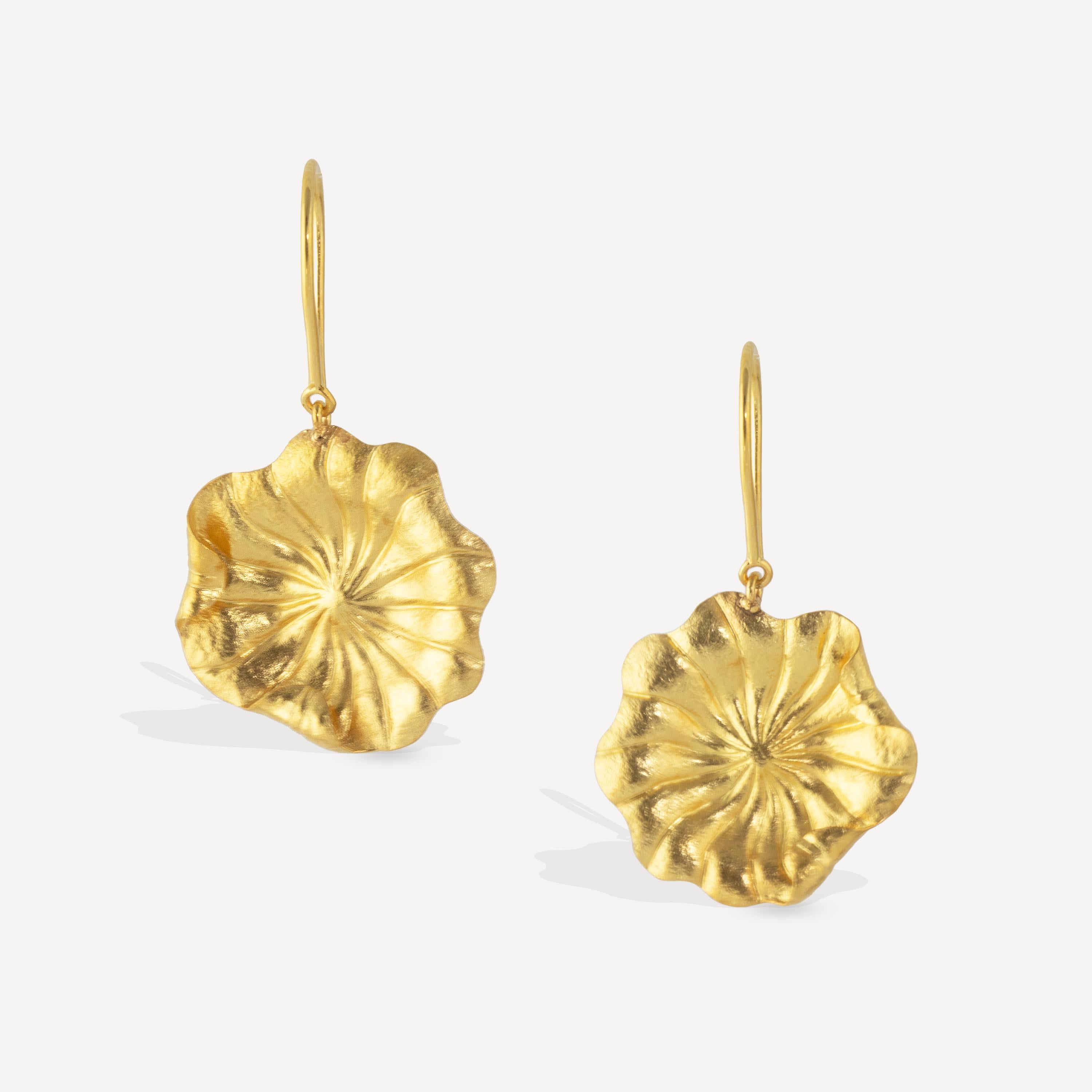 Ico & the Bird Fine Jewelry has collaborated with Turquoise Mountain Myanmar on a new collection celebrating the Lotus flower.
Each piece is handmade in Myanmar by master goldsmiths, trained in ancient techniques 

These earrings feature Lotus Leafs