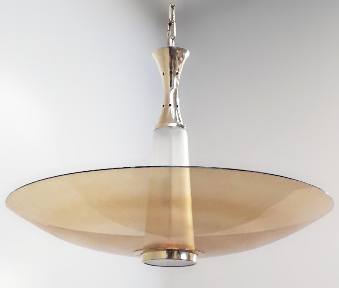 Italian modern chandelier or flushmount shown with smoked amber curved Murano glass shade with a beveled edge and frosted conical glass, mounted on solid polished brass hardware / Designed by Fabio Bergomi for Fabio Ltd / Made in Italy
1 light / E26
