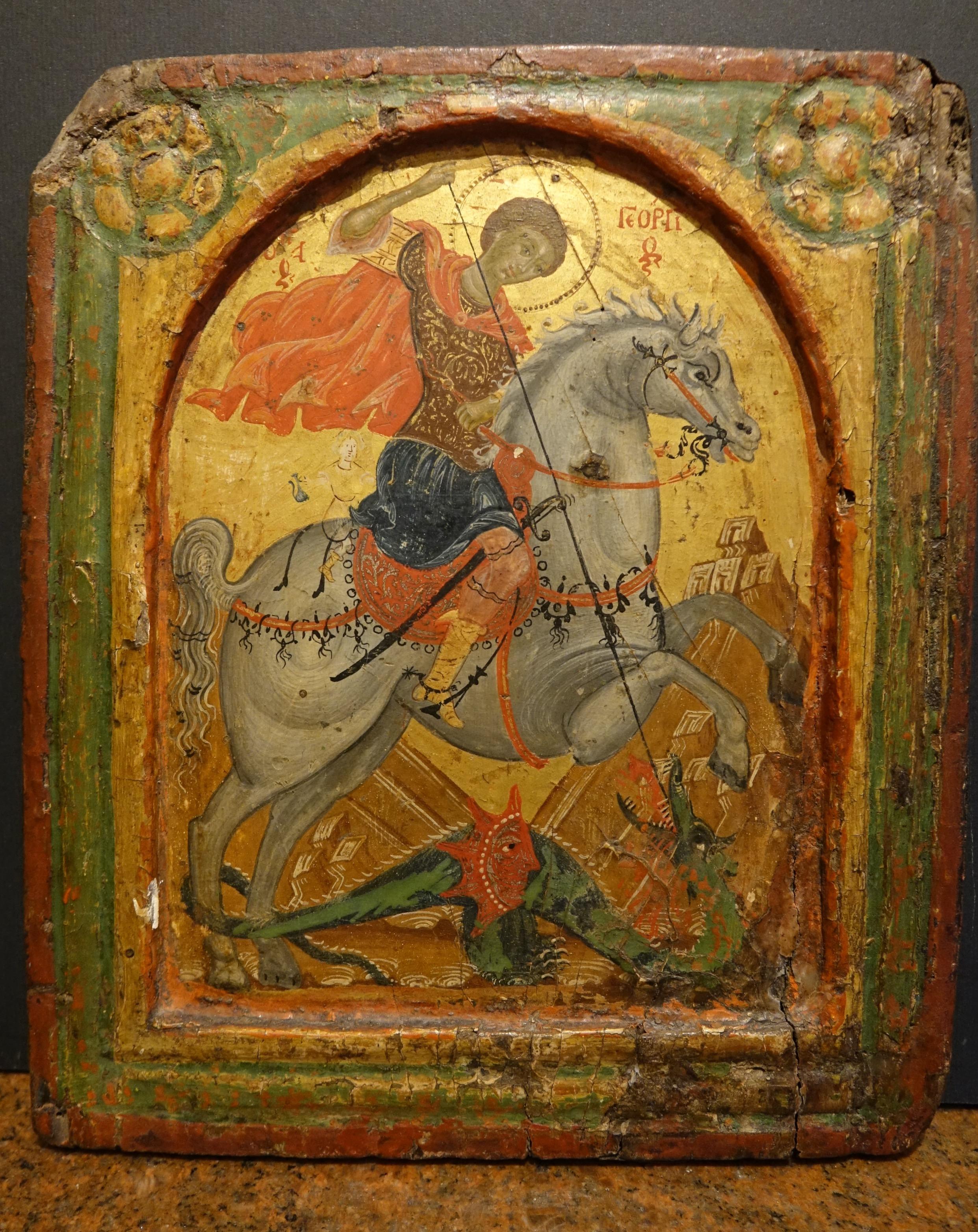 
 Temple y fondo dorado sobre tabla. 28,2 x 24,7 cm. 
Grietas y refuerzos.
 Escuela de Creta del siglo XVIII. 
Grecia 
He aquí la imagen iconográfica del niño rescatado por San Jorge, con la jarra de vino aún en la mano.
Este motivo se encuentra