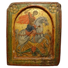 Iconique représentant Saint George combattant le dragon dans le style du 16e siècle.