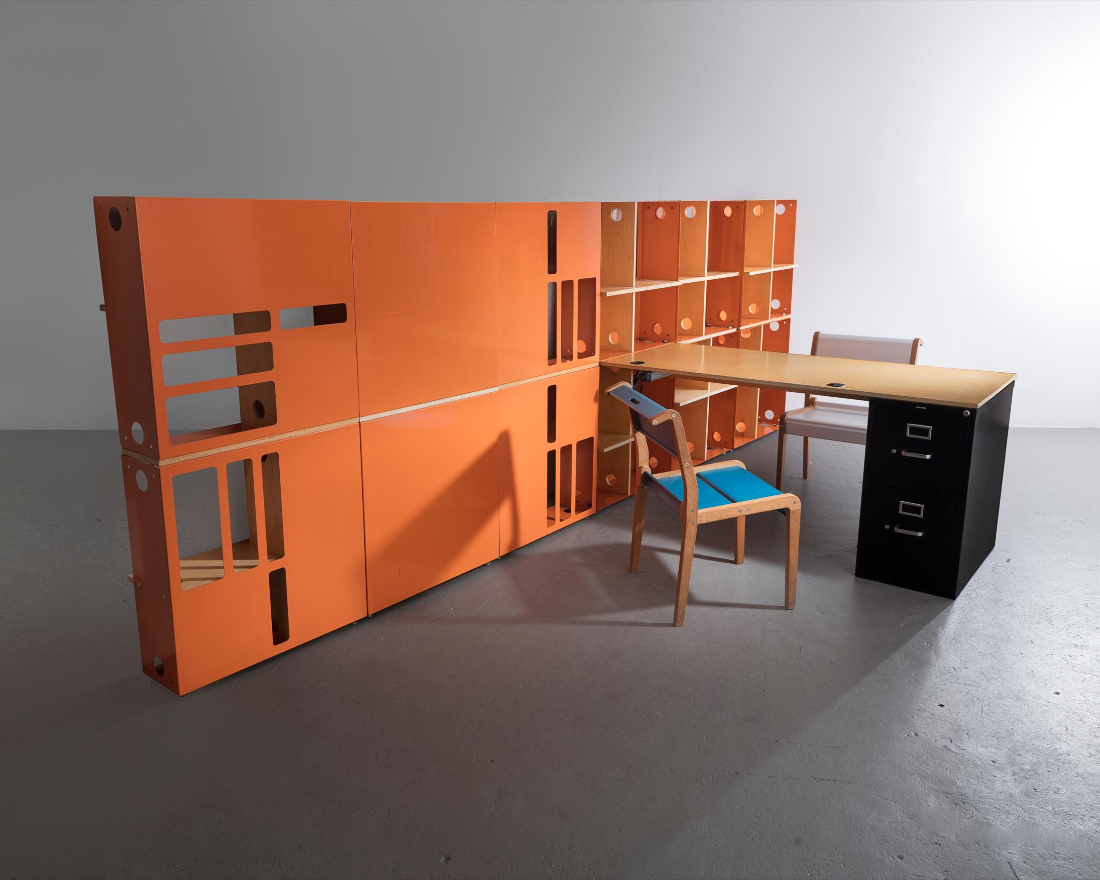 ICON shelving wall with built-in work station in painted metal. Dimensions are for a single module. Designed by Ali Tayar, 1999. Included in the 