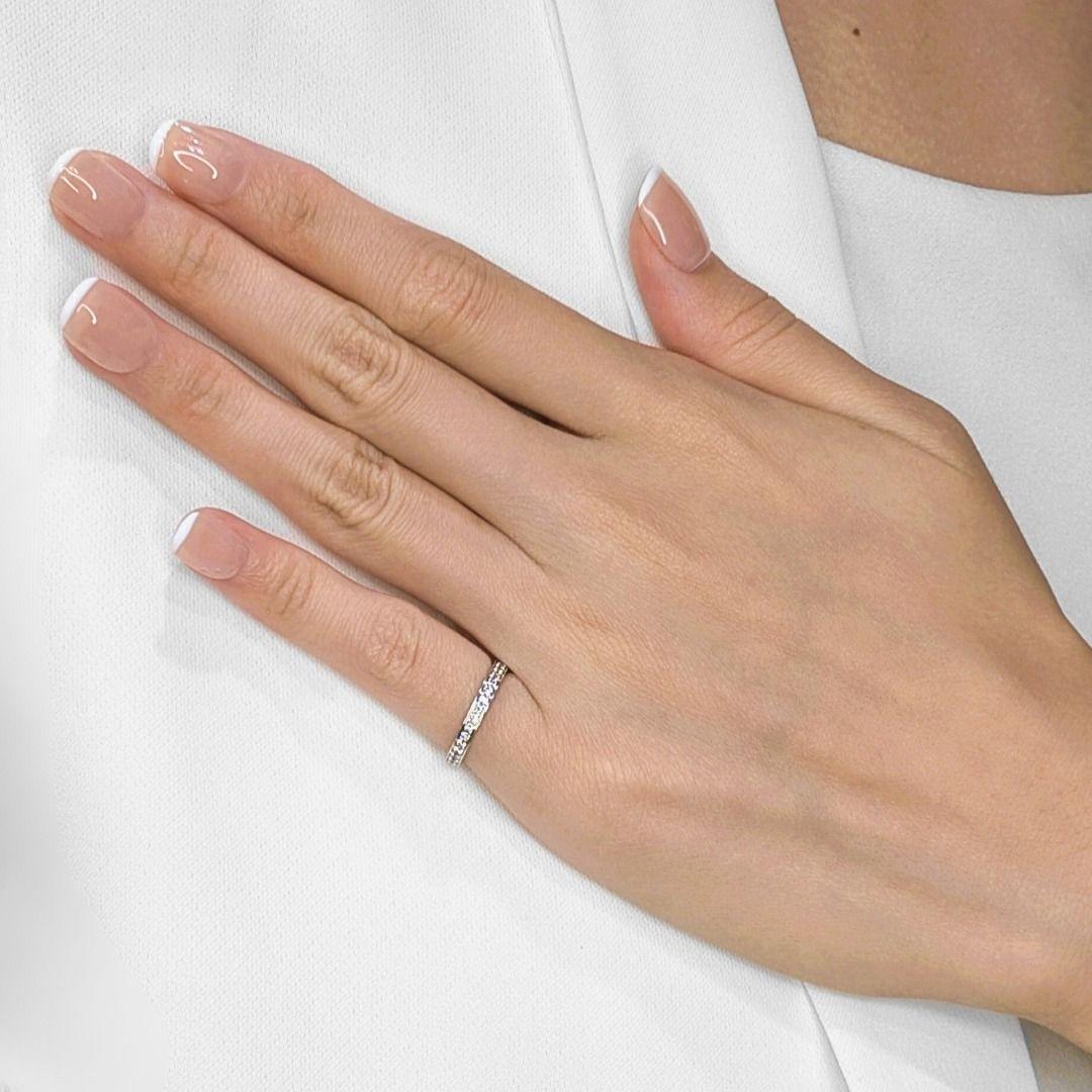 Experience the epitome of enduring luxury with this timeless full eternity ring by Cartier, meticulously crafted in radiant 18K white gold. A continuous circle of thirty-six dazzling natural round brilliant diamonds, totaling a brilliant 0.36ct,