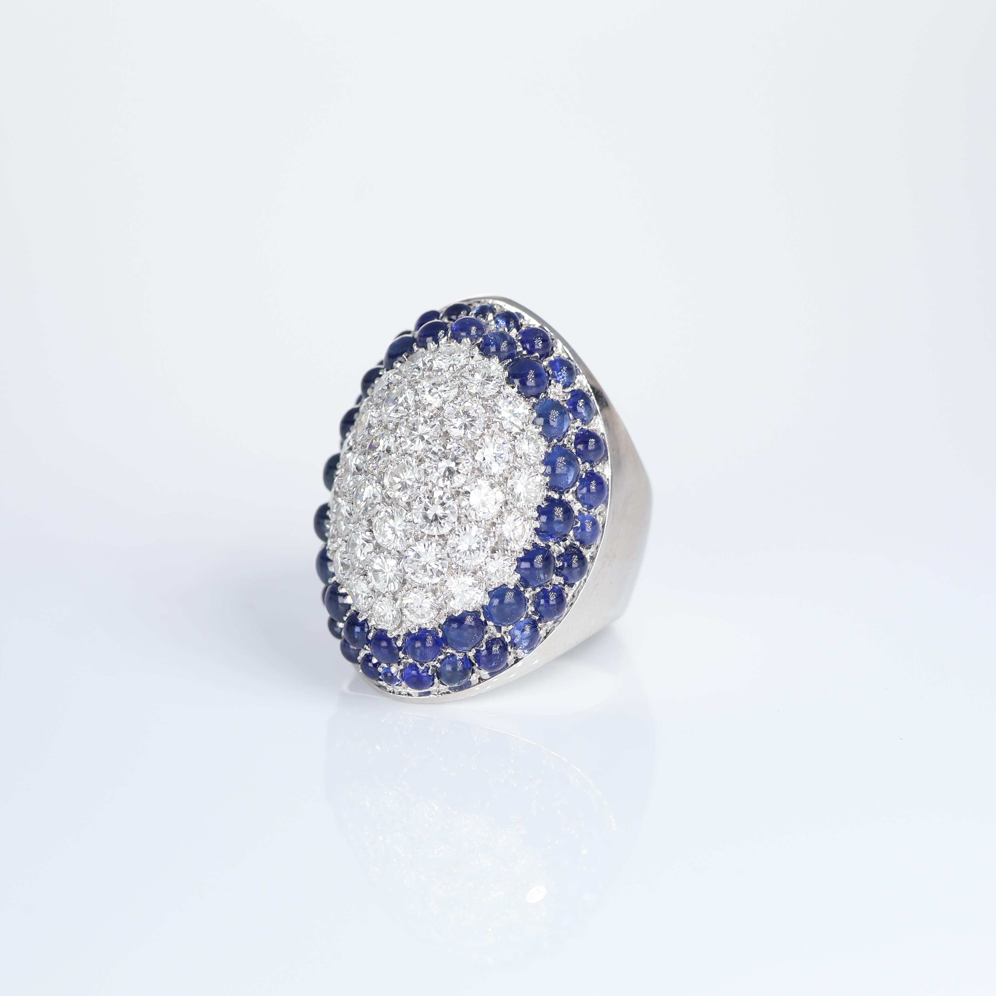 Brilliant Cut Iconic 18k White Gold Ring with Pavé of Diamonds 3.97 and Cabochon Sapphire 6.24 For Sale