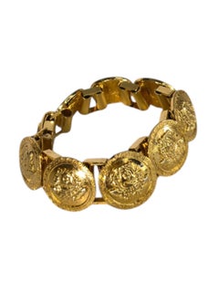 Bracciale con charme Medusa in oro dell'iconico Gianni Versace degli anni '90