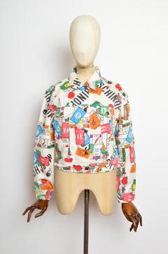 Chaqueta vaquera icónica de Moschino de los años 90, con un estampado original y colorido del Monopoly
