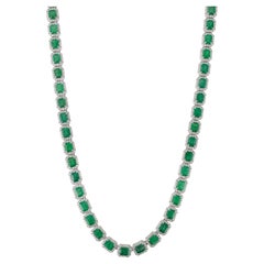 Iconic 24.47 Ct Emerald & 6.32 Ct Diamond Halo Tennis Necklace in 14K White Gold