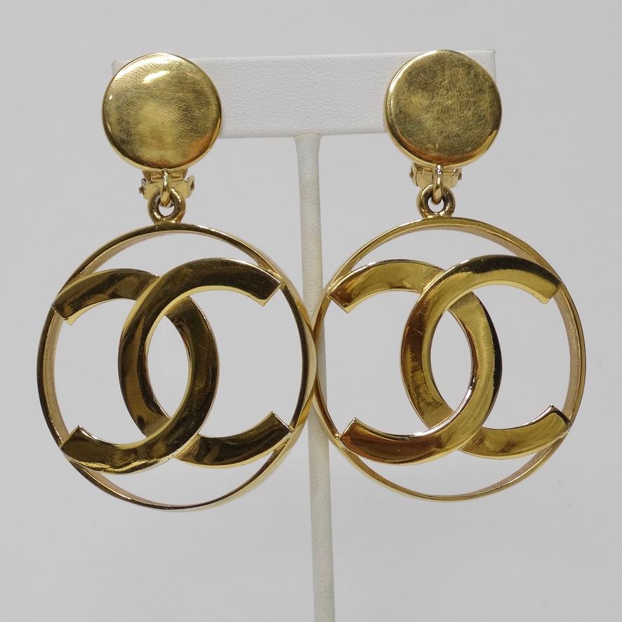 Women's or Men's Iconic 24K Gold Chanel 1980s Jumbo Interlocking 'C' Hoop Earrings For Sale