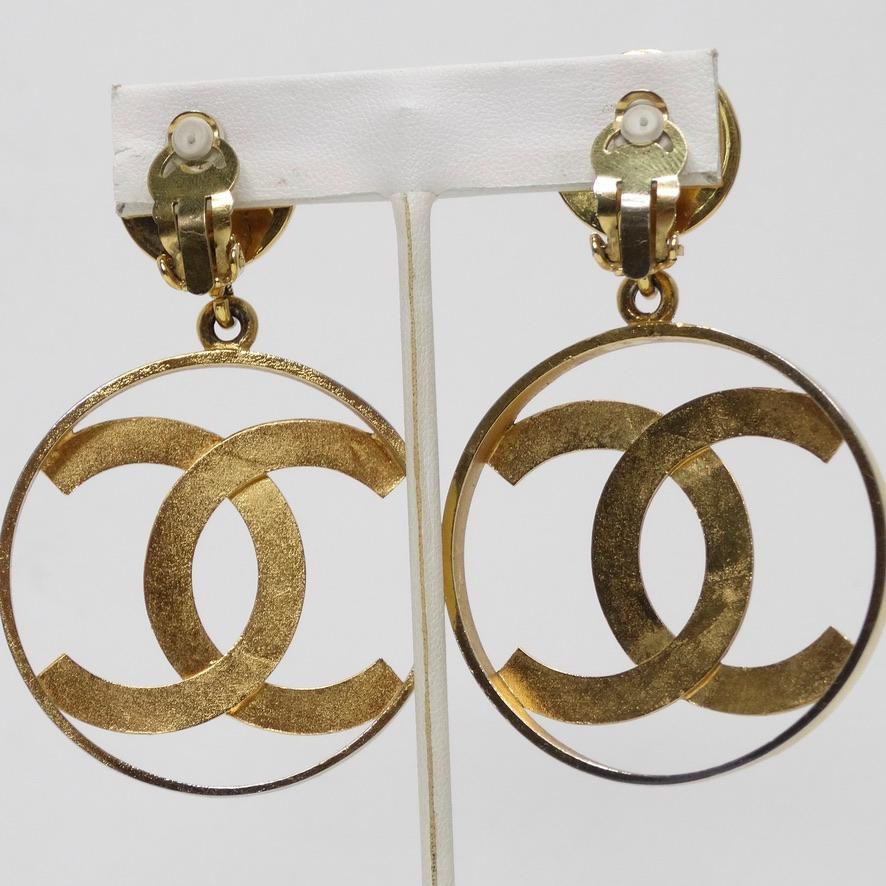 Iconic 24K Gold Chanel 1980s Jumbo Interlocking 'C' Hoop Earrings For Sale 1