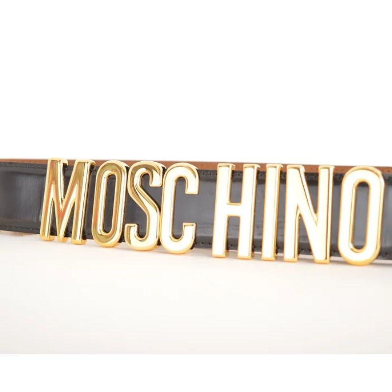 Iconsic 90's Moschino Spell out Gold Letter Leather Waist Belt in Black & Gold en vente 1