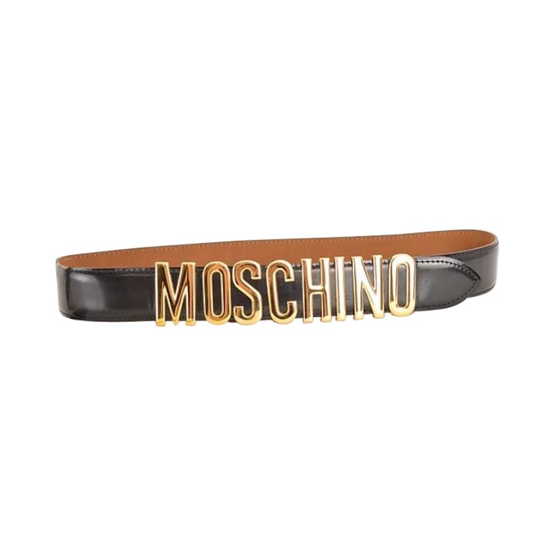 Iconsic 90's Moschino Spell out Gold Letter Leather Waist Belt in Black & Gold en vente