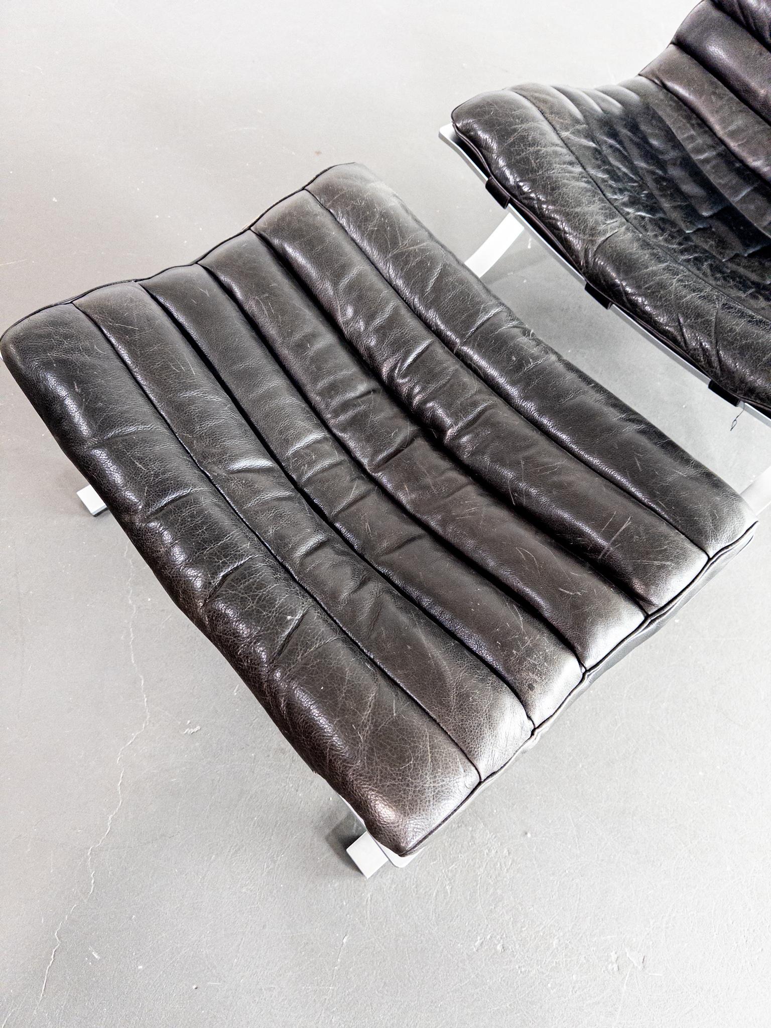 Steel Iconic “Ari” Lounge Chair with Ottoman by Arne Norell For Sale