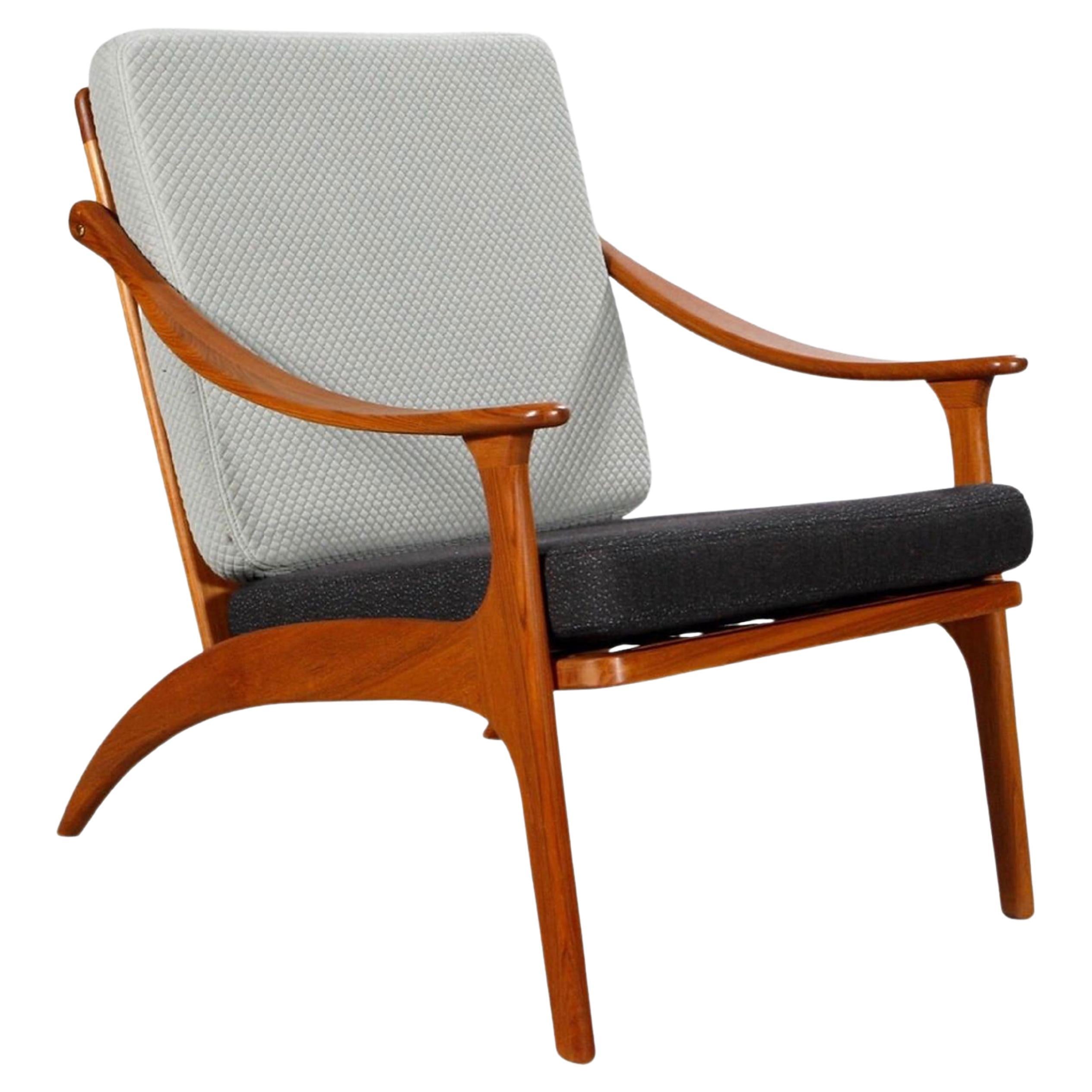 "Lean back" lounge chair by Danish designer Arne Hovmand-Olsen For Sale