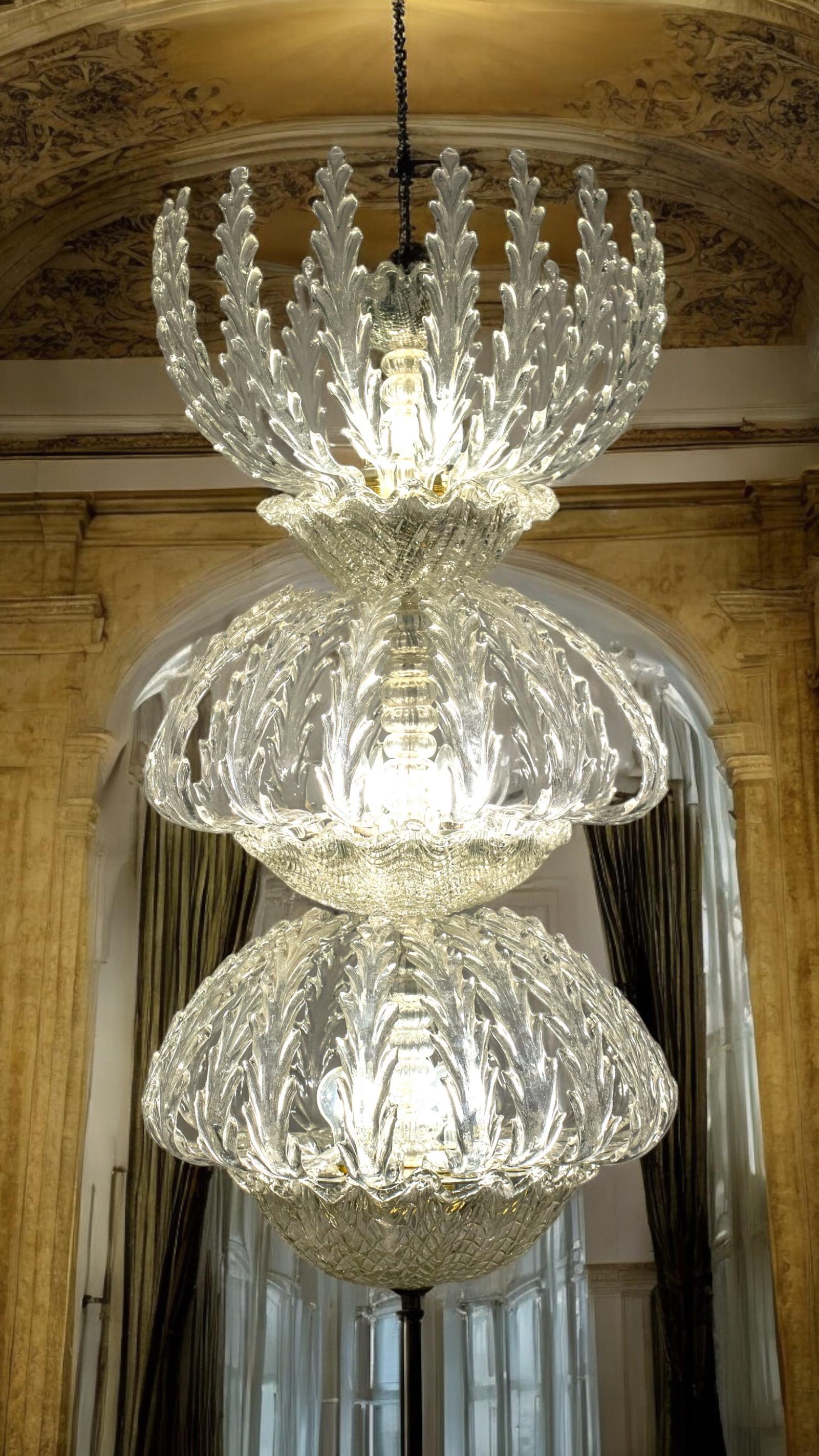 Piece of great value and elegance designed by Ercole Barovier, 1930-1940.
Similar model used by the famous architect Melchiorre Bega for the historic caffè Majani of Bologna . 
Similar model used also for the amazing Gambrinus in Naples. 
All glass