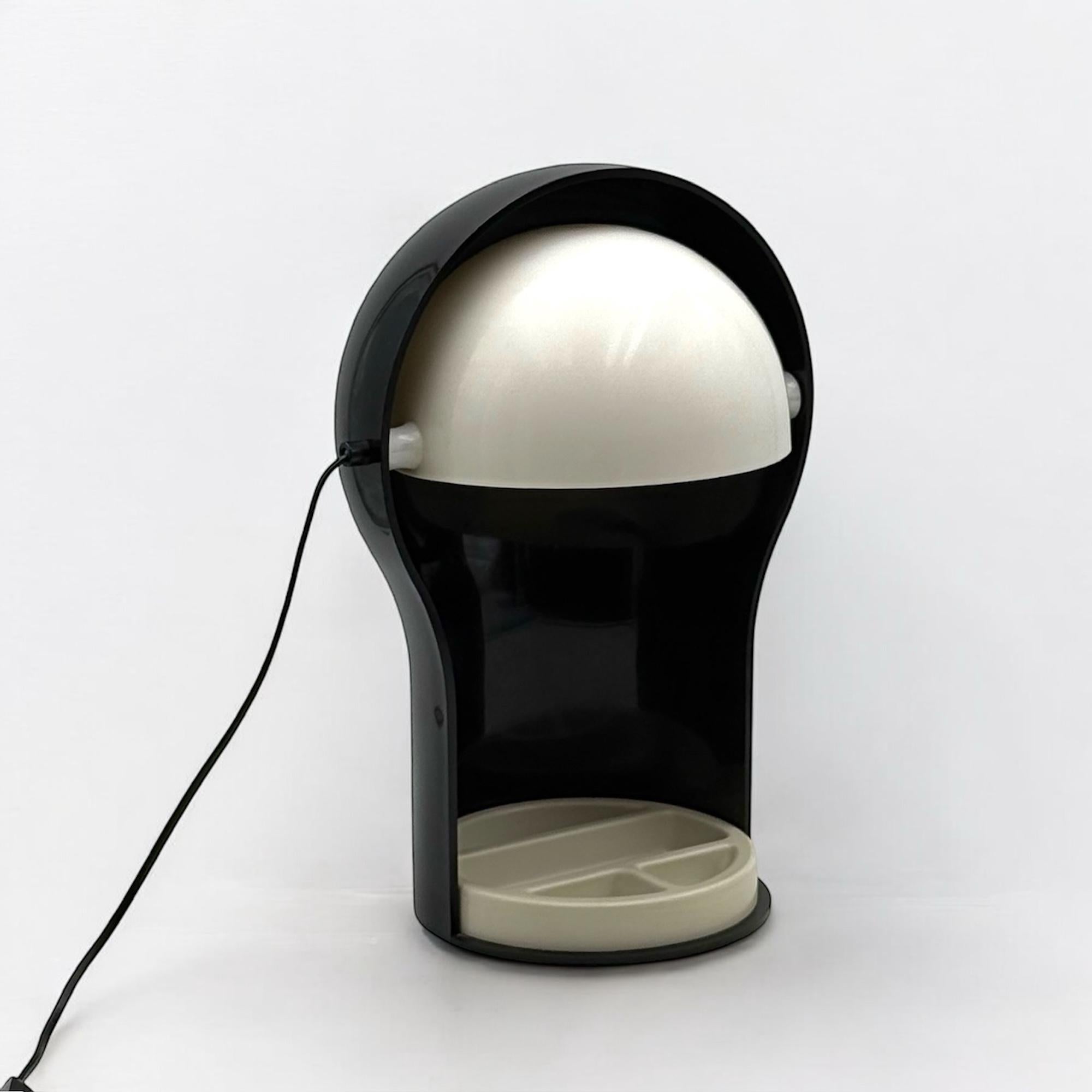 Experience a true icon of Italian design with this original Artemide Telegono lamp from the 1970s, designed by the legendary Vico Magistretti.

The iconic and rare Telegono lamp was designed by Vico Magistretti in 1966 and produced by Artemide from
