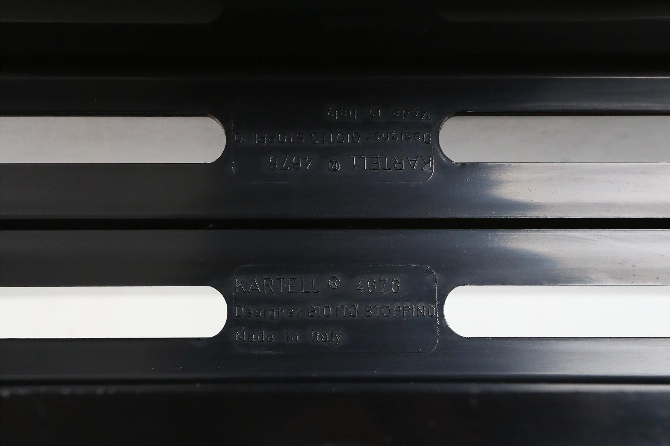 Plastic Iconic black magazine rack 4676 by Giotto Stoppino for Kartel, Italy 1970s For Sale