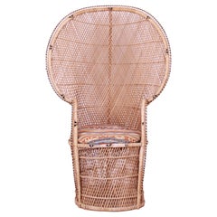 Silla icónica de mimbre bohemio Emanuelle Peacock, años 70