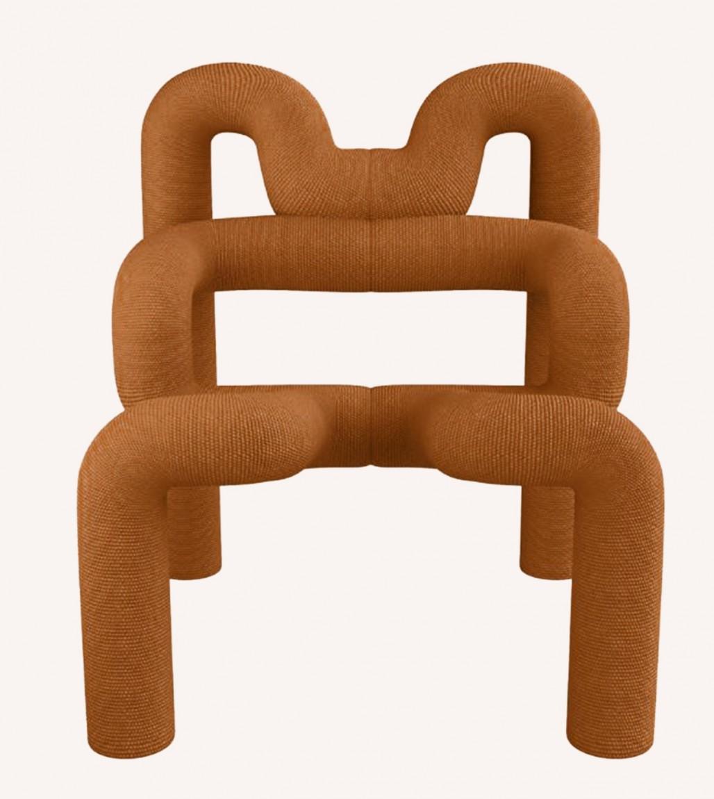 Iconic and stylish armchair, designed by Terje Ekstrom, handcrafted in Norway. In the color burned orange (brick). A real statement piece.

The chair is both modern and yet very functional. The design dates from around 1980. It’s distinguished by