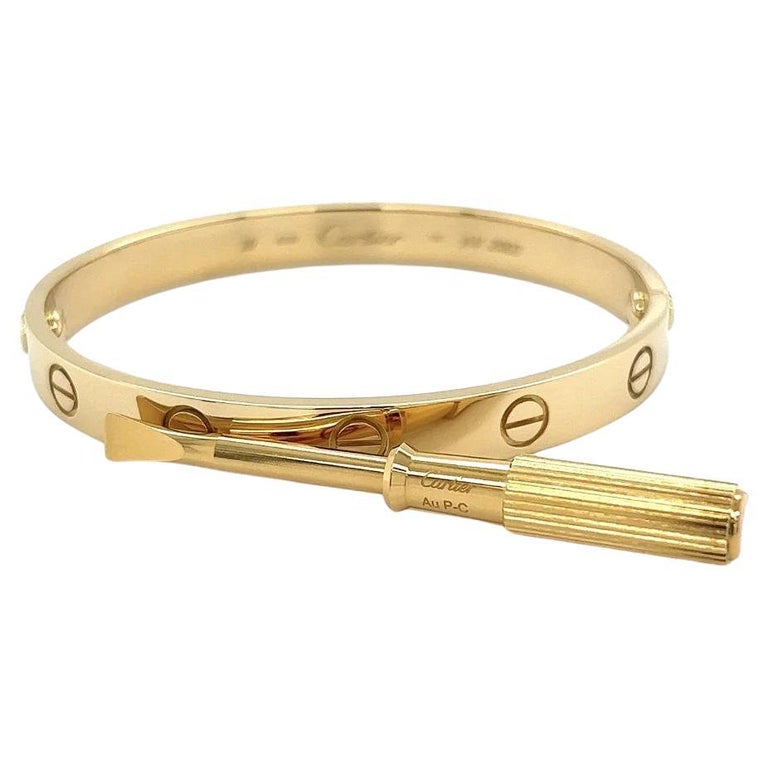 CARTIER Bracelet d'amour vintage emblématique en or avec papier et vis En  vente sur 1stDibs