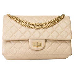 Iconic Chanel 2.55 double flap shoulder bag in aged beige quilted leather, GHW
