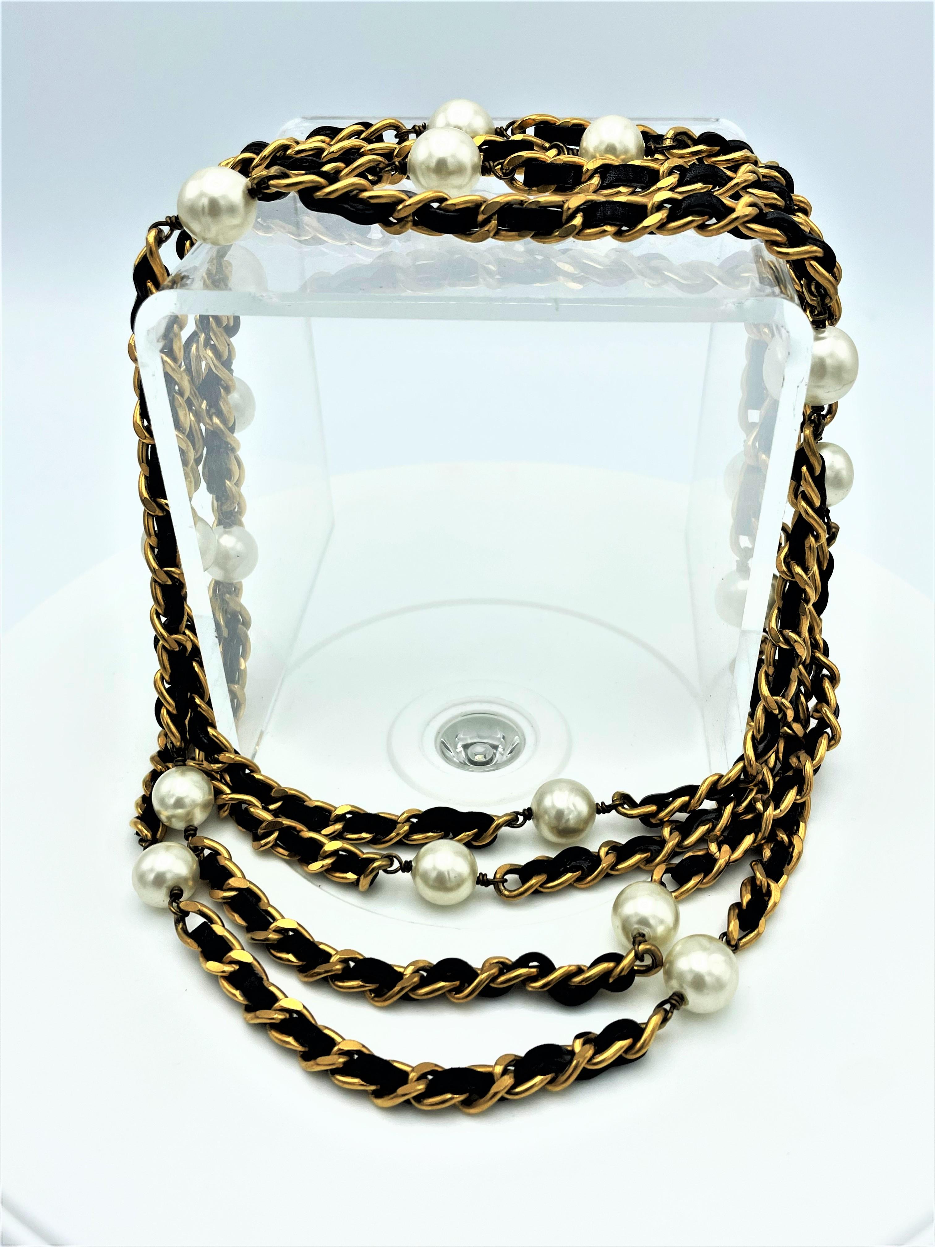 Women's Iconic Chanel chain with leather woven throughout and Chanel pearls, 1990s