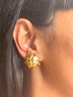 ICONIC CHANEL CLIP-ON EARRING,  pearl quilted with gold ribbons, signed 93 P