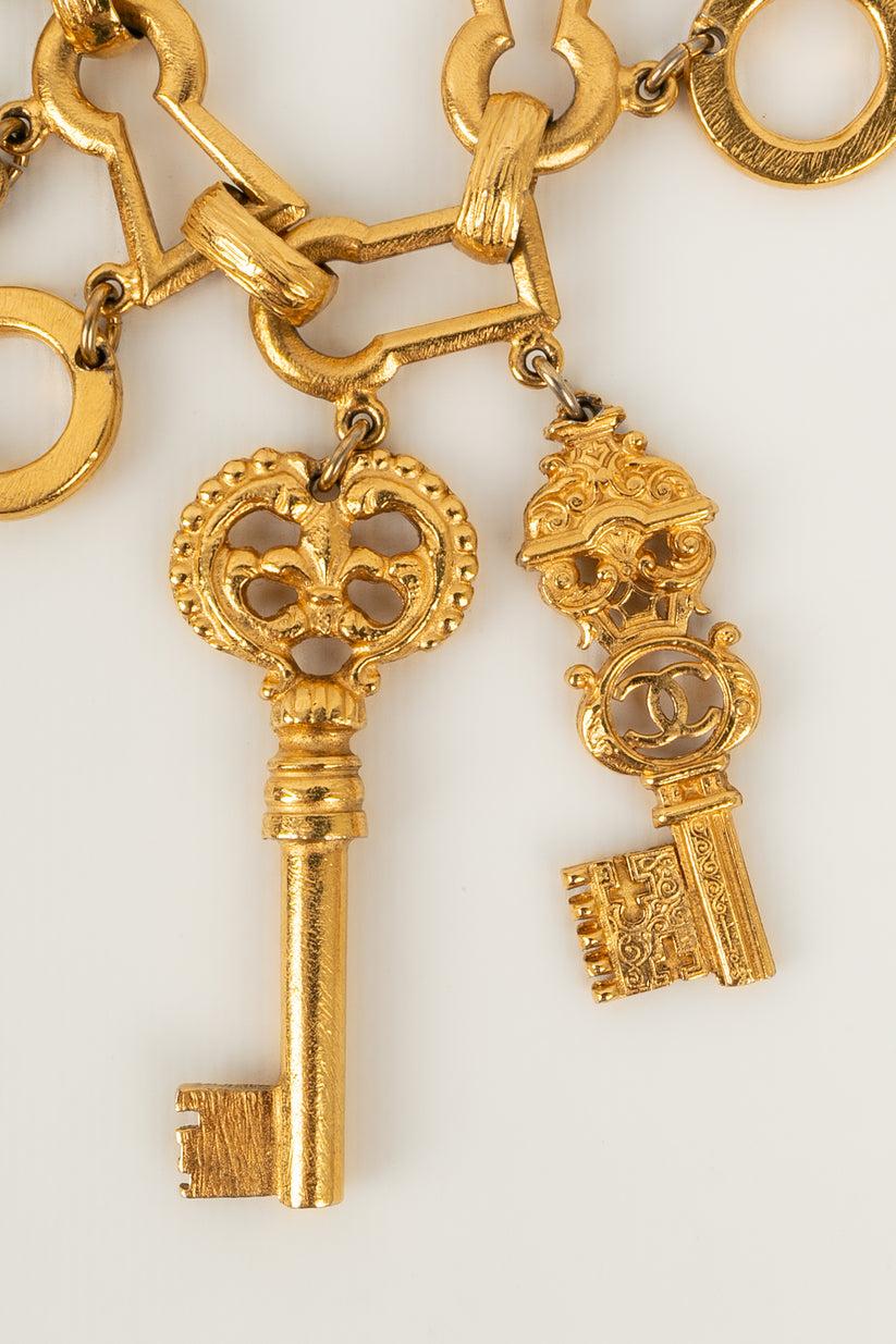 Ikonisches Chanel-Armband „ Keys“ aus vergoldetem Metall, 1993 im Angebot 4