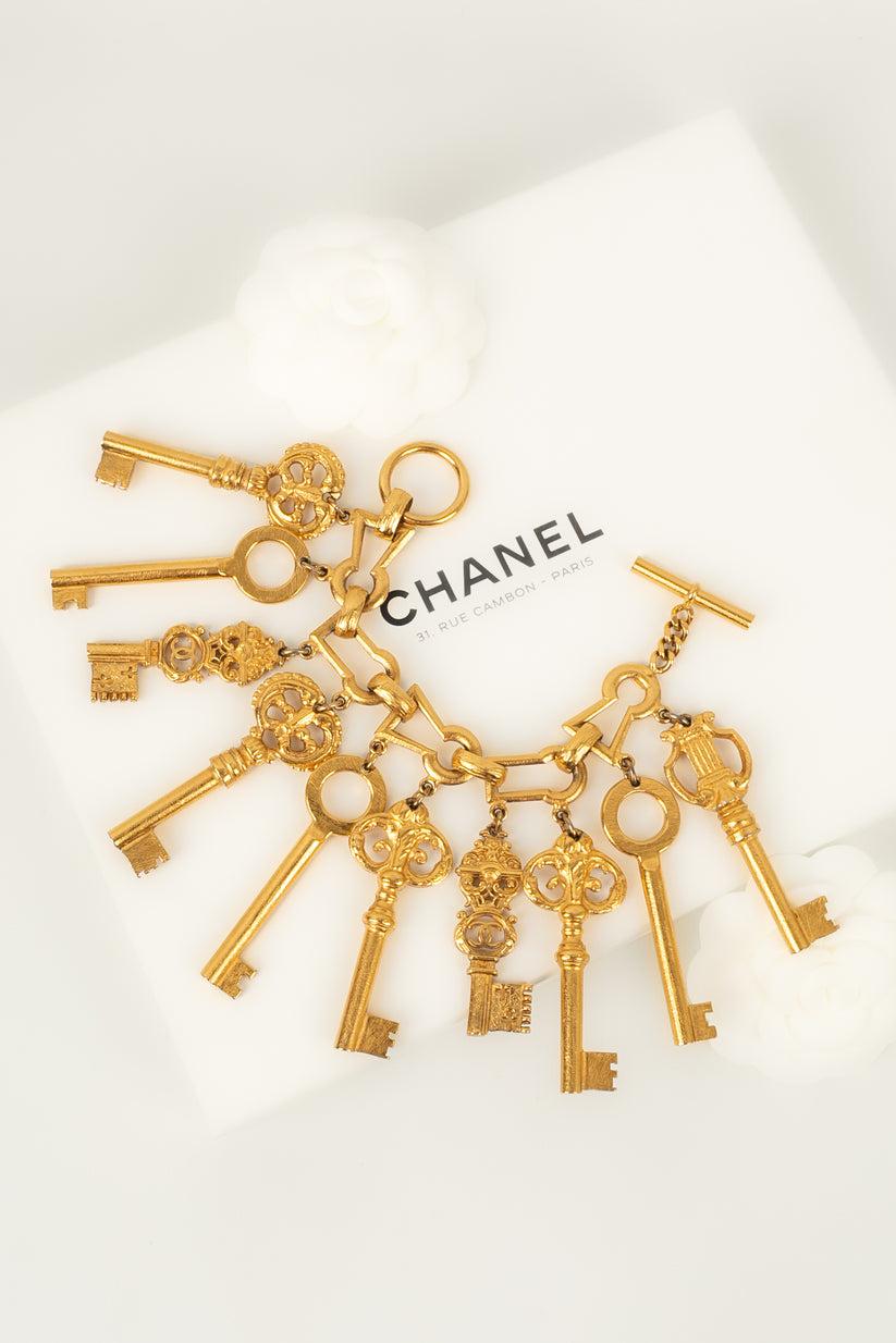 Ikonisches Chanel-Armband „ Keys“ aus vergoldetem Metall, 1993 im Angebot 5