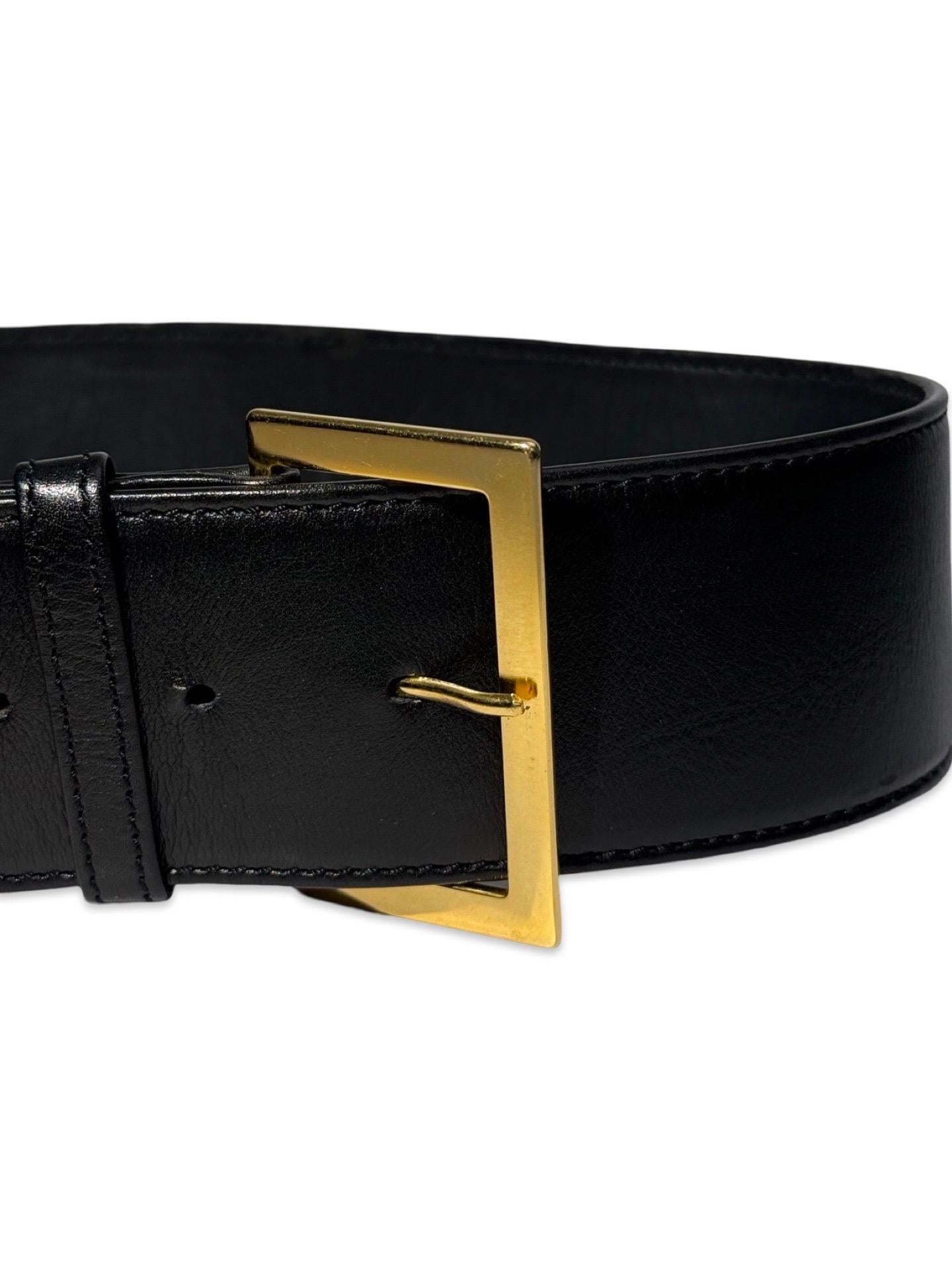 A rare, large Chanel Logo Waist Belt from 1997 -as worn on the runway by Naomi Campbell and Stella Tenant. It features a very large gold bar with CHANEL logo at the front, internal logo foil stamp and date, and gold buckle at rear. 

Marked size: